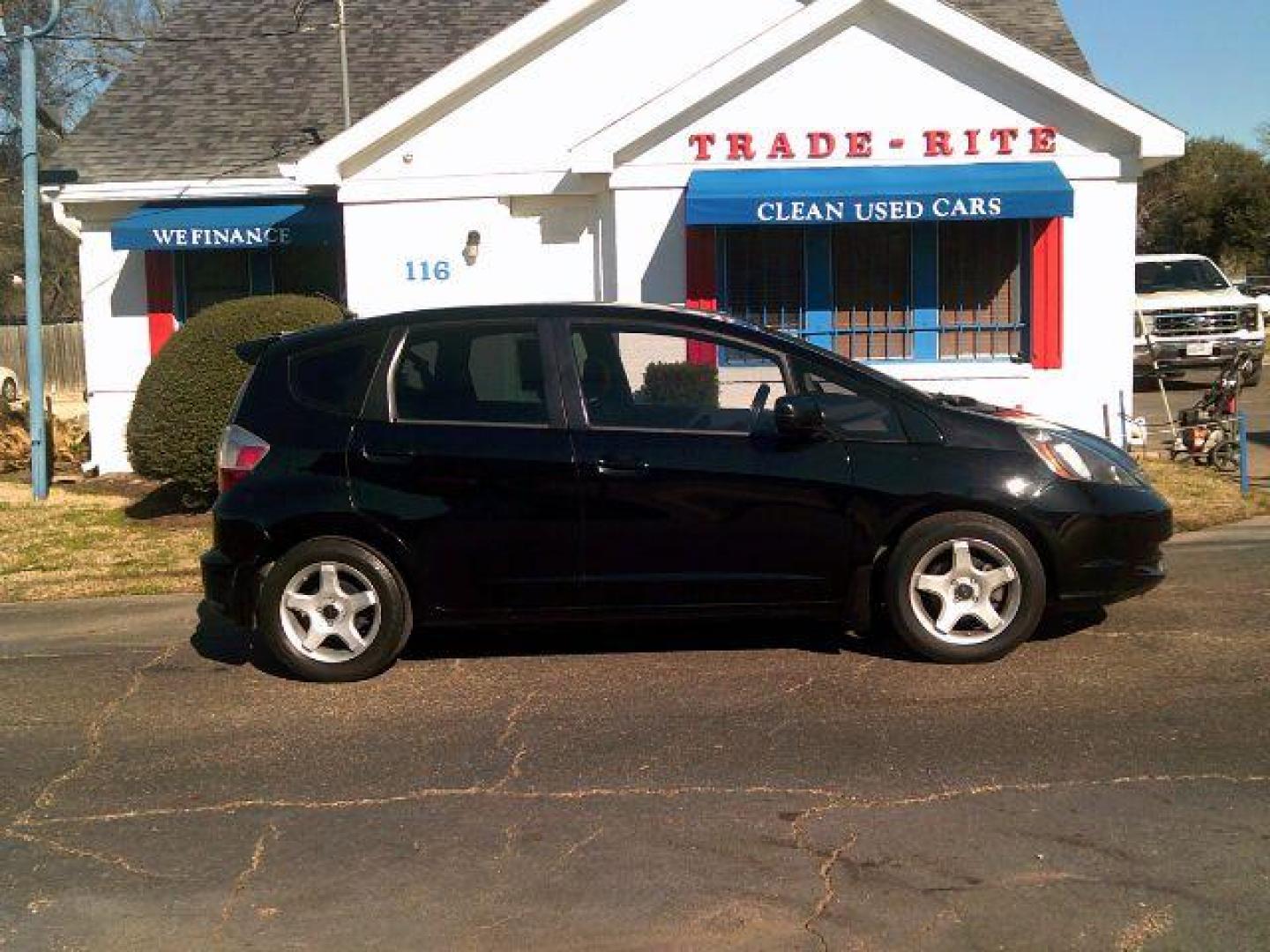 2009 Crystal Black Pearl Honda Fit 5-Speed MT (JHMGE87219S) with an 1.5L L4 SOHC 16V engine, 5-Speed Manual transmission, located at 116 N. Frazier Street, Conroe, TX, 77301, (936) 647-0690, 30.308662, -95.460480 - Photo#0