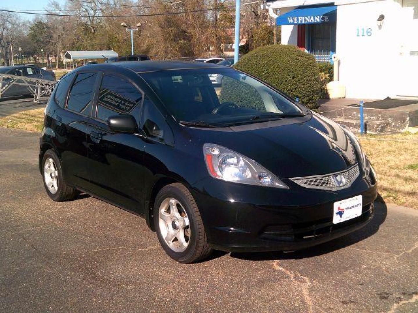 2009 Crystal Black Pearl Honda Fit 5-Speed MT (JHMGE87219S) with an 1.5L L4 SOHC 16V engine, 5-Speed Manual transmission, located at 116 N. Frazier Street, Conroe, TX, 77301, (936) 647-0690, 30.308662, -95.460480 - Photo#1