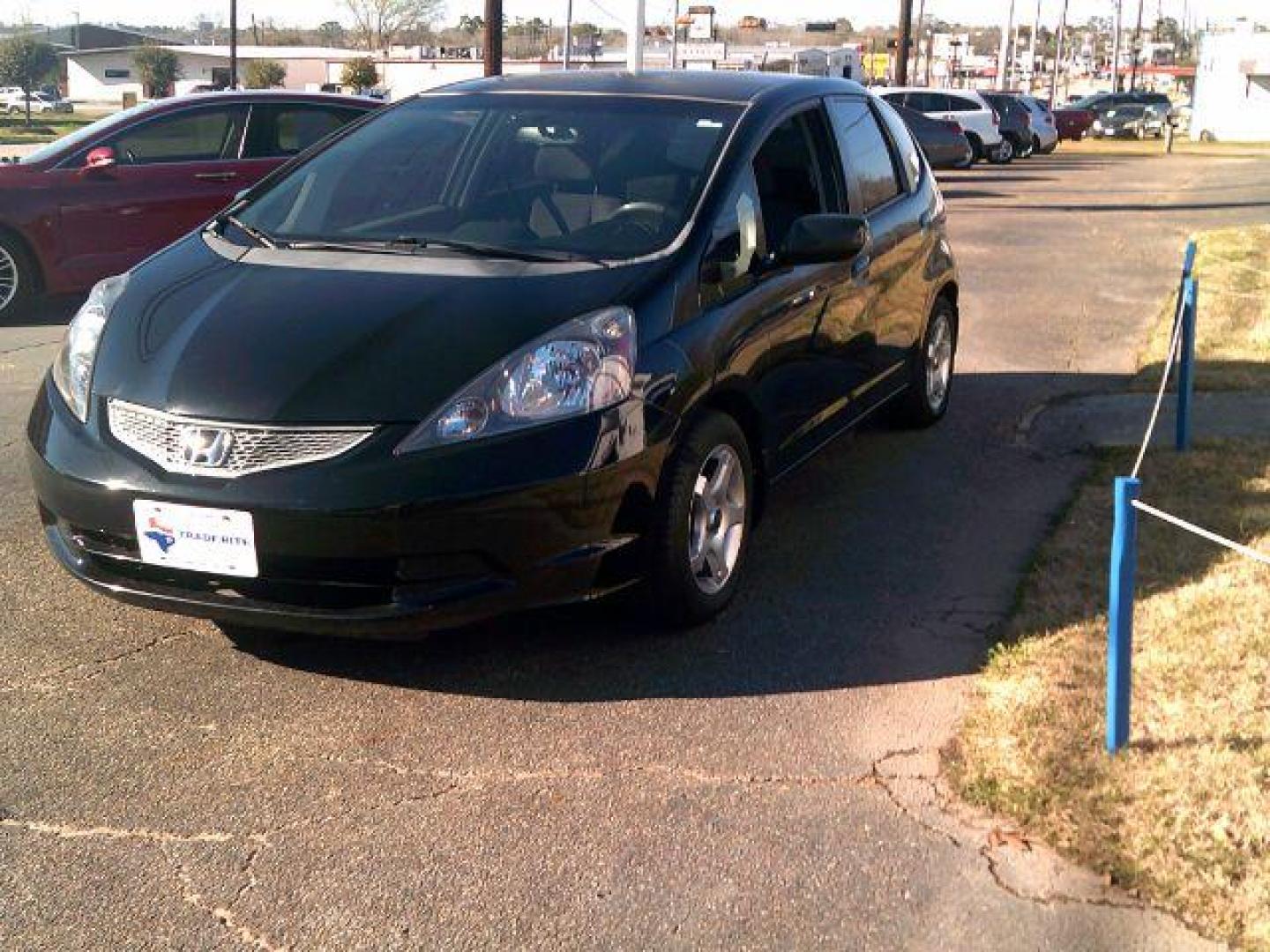 2009 Crystal Black Pearl Honda Fit 5-Speed MT (JHMGE87219S) with an 1.5L L4 SOHC 16V engine, 5-Speed Manual transmission, located at 116 N. Frazier Street, Conroe, TX, 77301, (936) 647-0690, 30.308662, -95.460480 - Photo#2