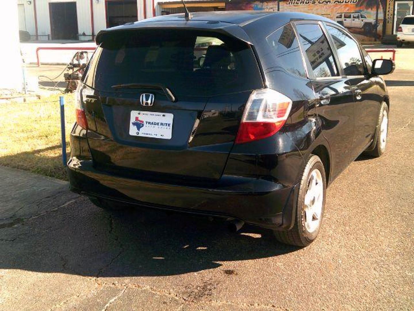 2009 Crystal Black Pearl Honda Fit 5-Speed MT (JHMGE87219S) with an 1.5L L4 SOHC 16V engine, 5-Speed Manual transmission, located at 116 N. Frazier Street, Conroe, TX, 77301, (936) 647-0690, 30.308662, -95.460480 - Photo#5