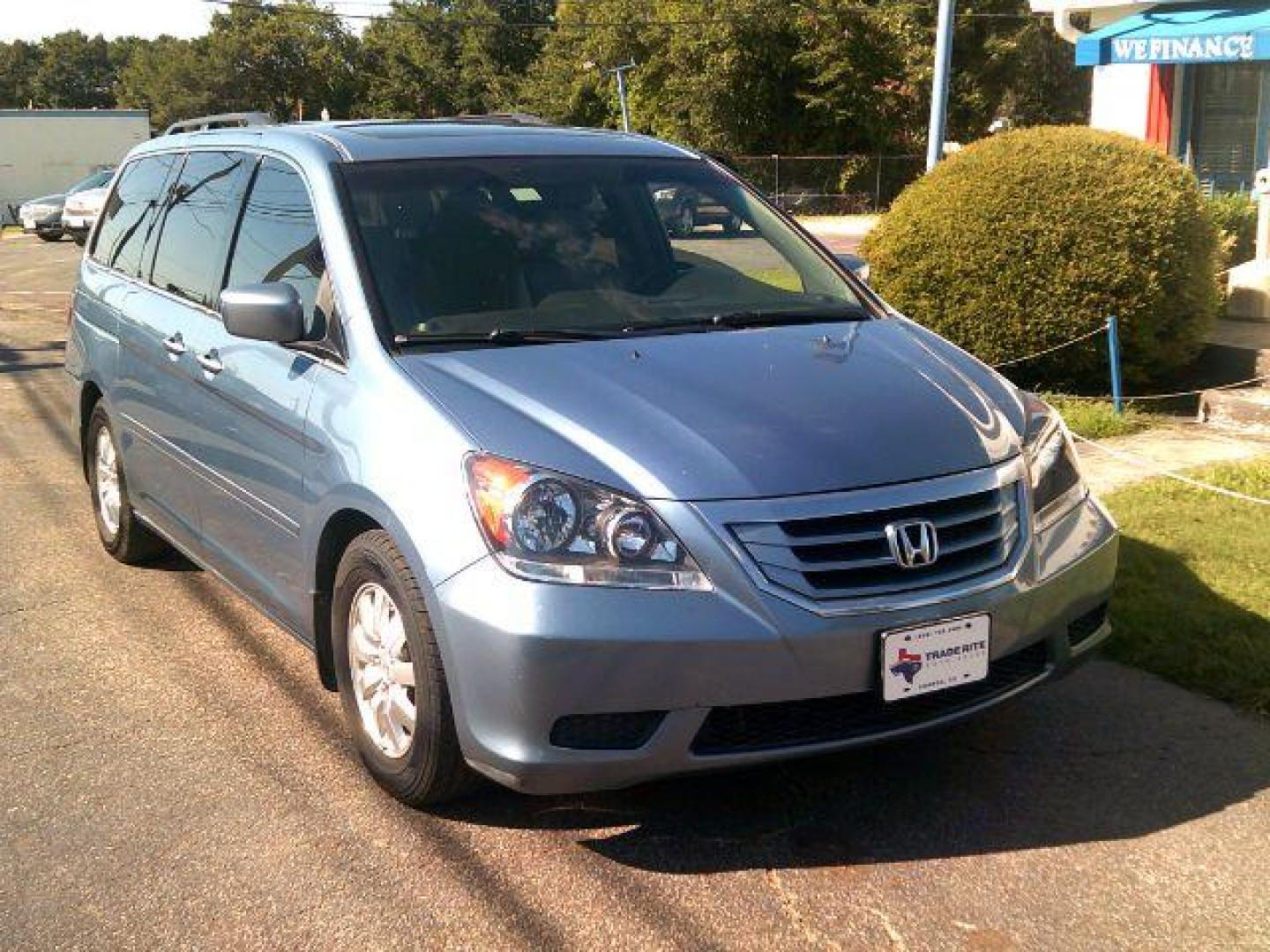 2010 Bali Blue Pearl /Gray Leather Interio Honda Odyssey EX-L w/ DVD and Navi (5FNRL3H71AB) with an 3.5L V6 SOHC 24V engine, 5-Speed Automatic transmission, located at 116 N. Frazier Street, Conroe, TX, 77301, (936) 647-0690, 30.308662, -95.460480 - Photo#1