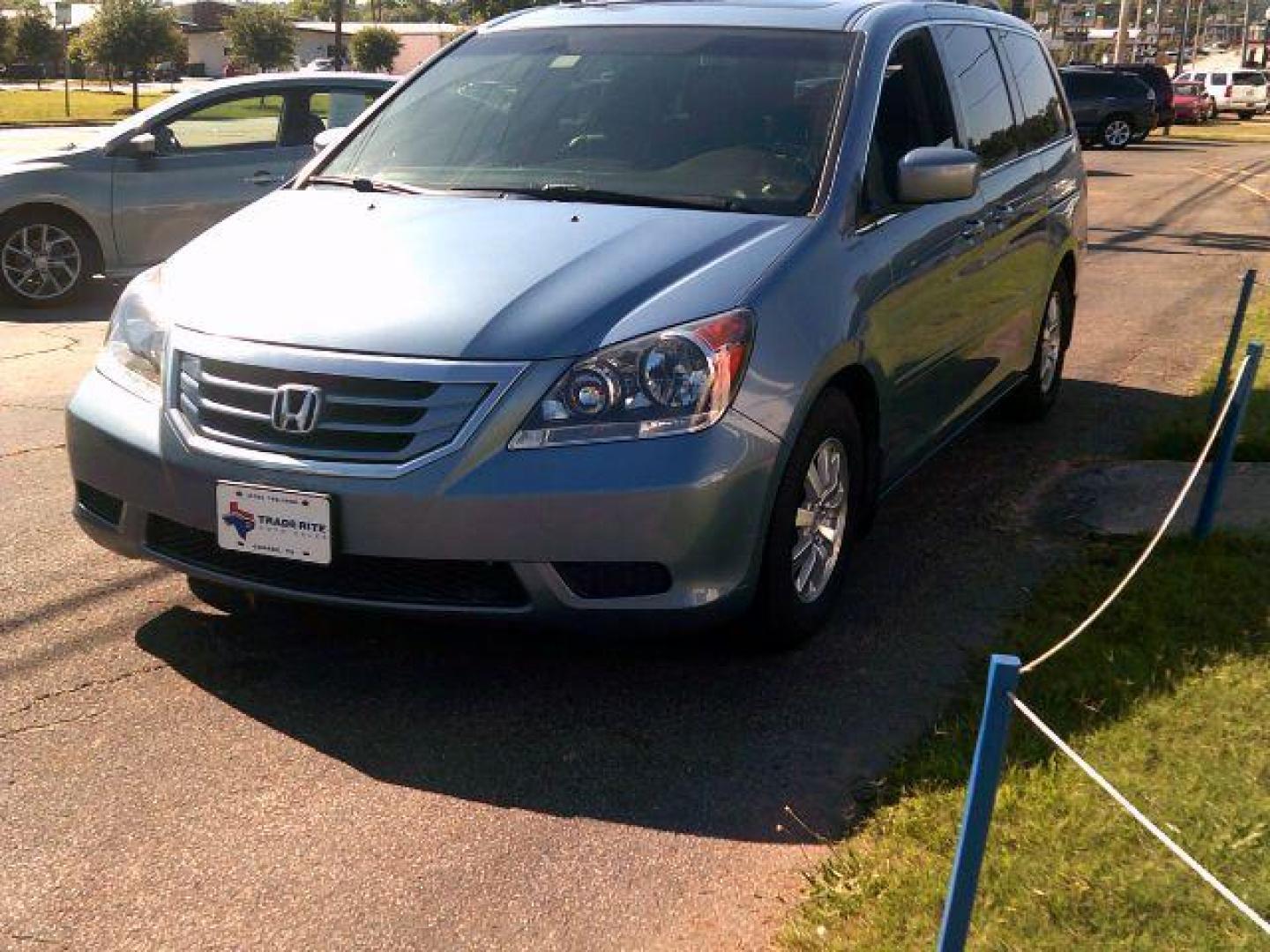 2010 Bali Blue Pearl /Gray Leather Interio Honda Odyssey EX-L w/ DVD and Navi (5FNRL3H71AB) with an 3.5L V6 SOHC 24V engine, 5-Speed Automatic transmission, located at 116 N. Frazier Street, Conroe, TX, 77301, (936) 647-0690, 30.308662, -95.460480 - Photo#2