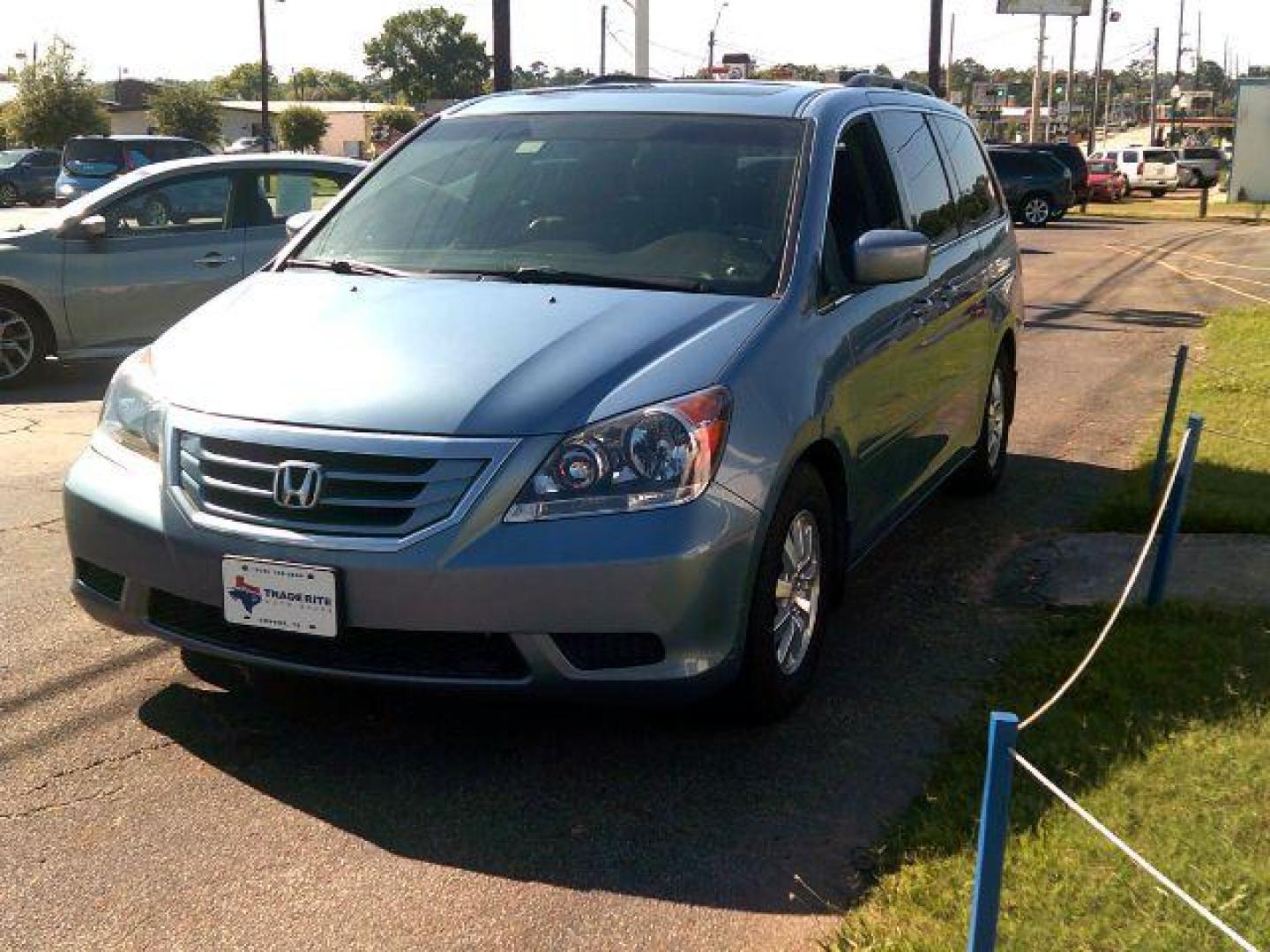 2010 Bali Blue Pearl /Gray Leather Interio Honda Odyssey EX-L w/ DVD and Navi (5FNRL3H71AB) with an 3.5L V6 SOHC 24V engine, 5-Speed Automatic transmission, located at 116 N. Frazier Street, Conroe, TX, 77301, (936) 647-0690, 30.308662, -95.460480 - Photo#3