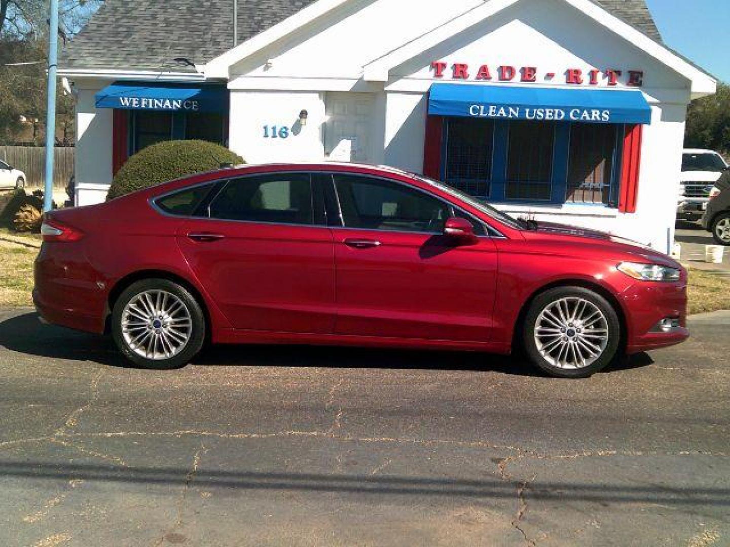 2016 Ruby Red Metallic Ti /Dune, leather Ford Fusion SE (3FA6P0HD8GR) with an 1.5L L4 DOHC 16V engine, 6-Speed Automatic transmission, located at 116 N. Frazier Street, Conroe, TX, 77301, (936) 647-0690, 30.308662, -95.460480 - Photo#0