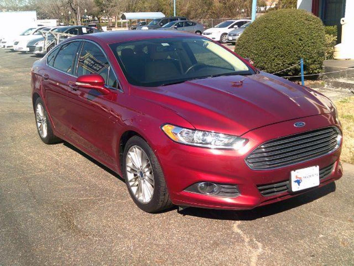 2016 Ruby Red Metallic Ti /Dune, leather Ford Fusion SE (3FA6P0HD8GR) with an 1.5L L4 DOHC 16V engine, 6-Speed Automatic transmission, located at 116 N. Frazier Street, Conroe, TX, 77301, (936) 647-0690, 30.308662, -95.460480 - Photo#1