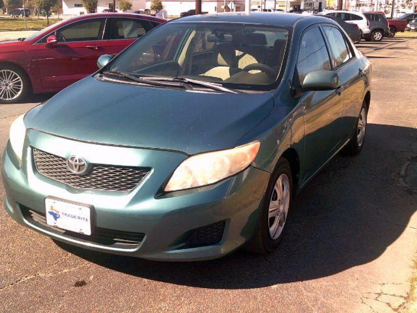 2009 Capri Sea Metallic /Ash Cloth Interior Toyota Corolla LE 4-Speed AT (JTDBL40E999) with an 1.8L L4 DOHC 16V engine, 4-Speed Automatic transmission, located at 116 N. Frazier Street, Conroe, TX, 77301, (936) 647-0690, 30.308662, -95.460480 - Photo#2