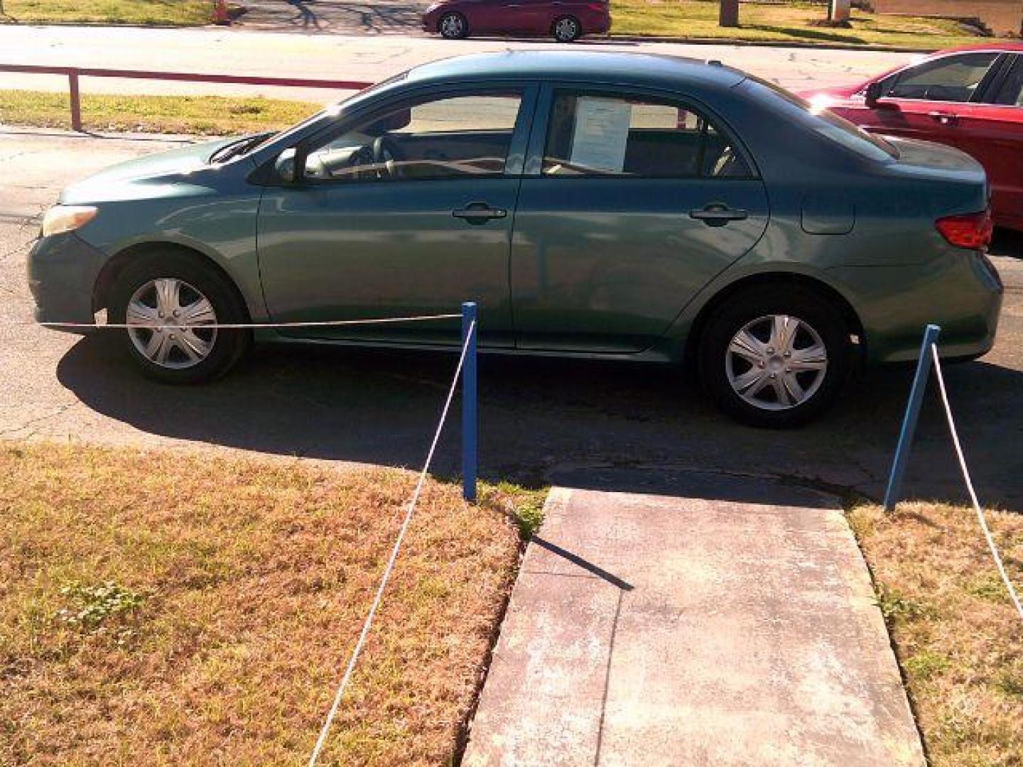 2009 Capri Sea Metallic /Ash Cloth Interior Toyota Corolla LE 4-Speed AT (JTDBL40E999) with an 1.8L L4 DOHC 16V engine, 4-Speed Automatic transmission, located at 116 N. Frazier Street, Conroe, TX, 77301, (936) 647-0690, 30.308662, -95.460480 - Photo#3