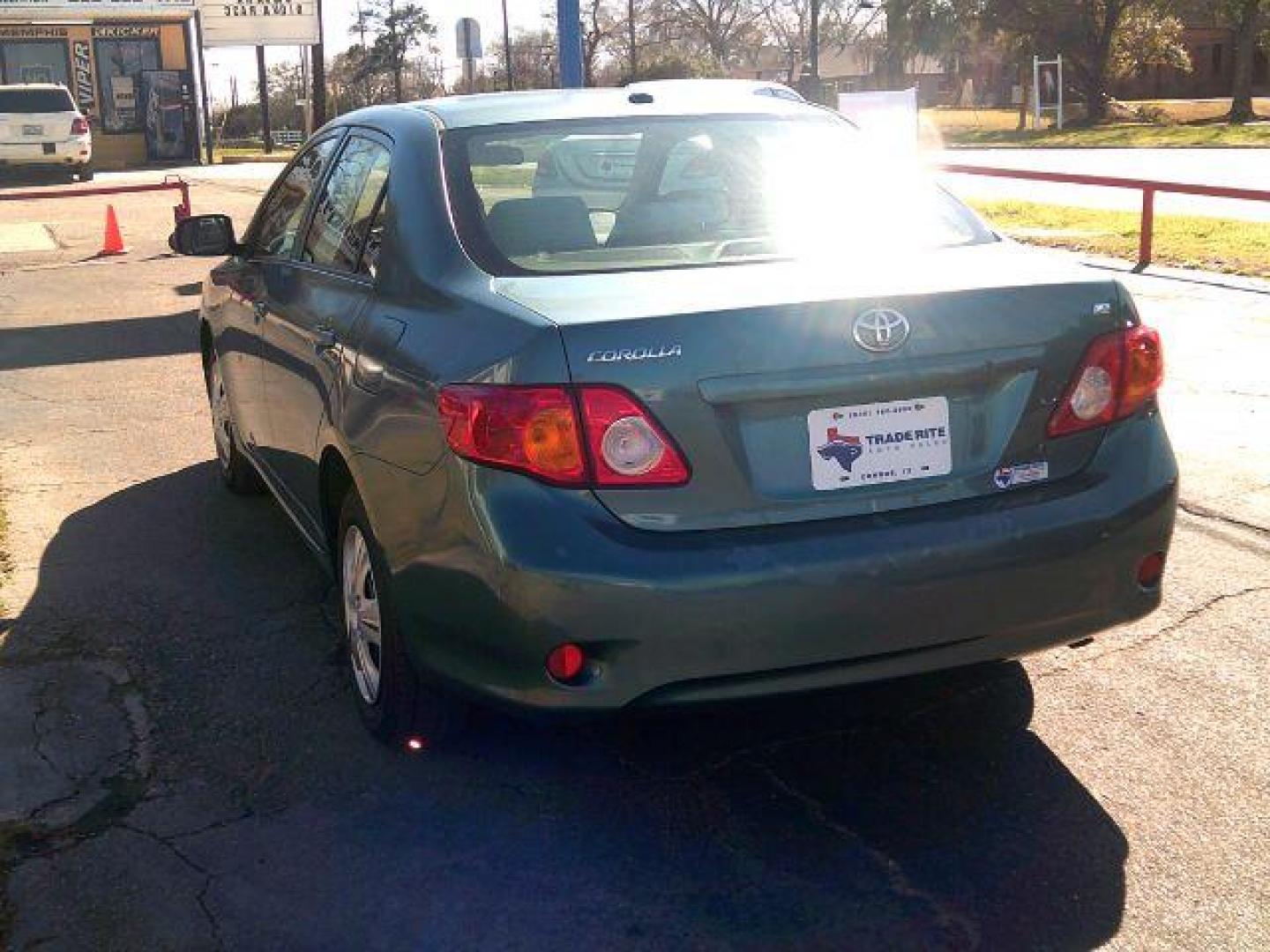 2009 Capri Sea Metallic /Ash Cloth Interior Toyota Corolla LE 4-Speed AT (JTDBL40E999) with an 1.8L L4 DOHC 16V engine, 4-Speed Automatic transmission, located at 116 N. Frazier Street, Conroe, TX, 77301, (936) 647-0690, 30.308662, -95.460480 - Photo#4