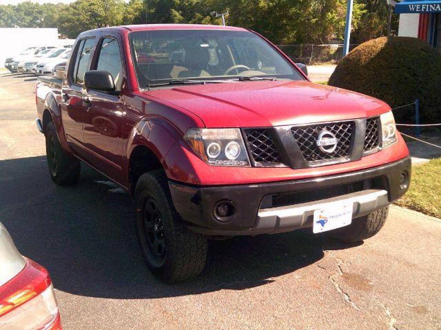 2008 Red Brawn /Beige Cloth Interior Nissan Frontier SE Crew Cab 2WD (1N6AD07U38C) with an 4.0L V6 DOHC 24V engine, 5-Speed Automatic transmission, located at 116 N. Frazier Street, Conroe, TX, 77301, (936) 647-0690, 30.308662, -95.460480 - Photo#1