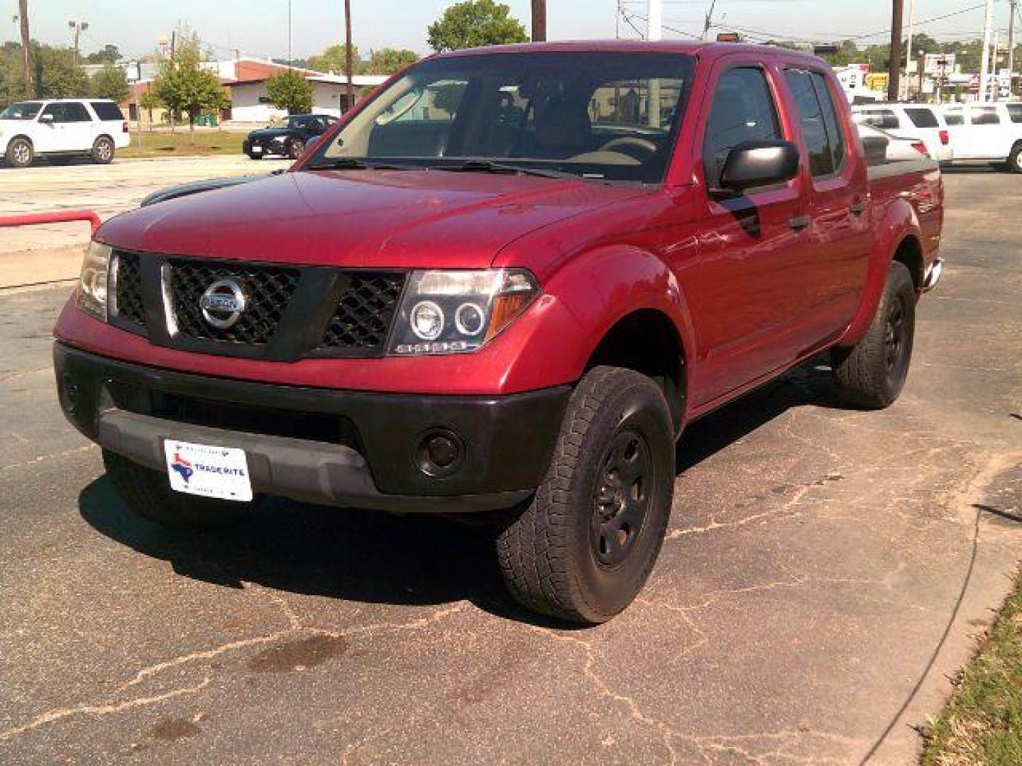 2008 Red Brawn /Beige Cloth Interior Nissan Frontier SE Crew Cab 2WD (1N6AD07U38C) with an 4.0L V6 DOHC 24V engine, 5-Speed Automatic transmission, located at 116 N. Frazier Street, Conroe, TX, 77301, (936) 647-0690, 30.308662, -95.460480 - Photo#2