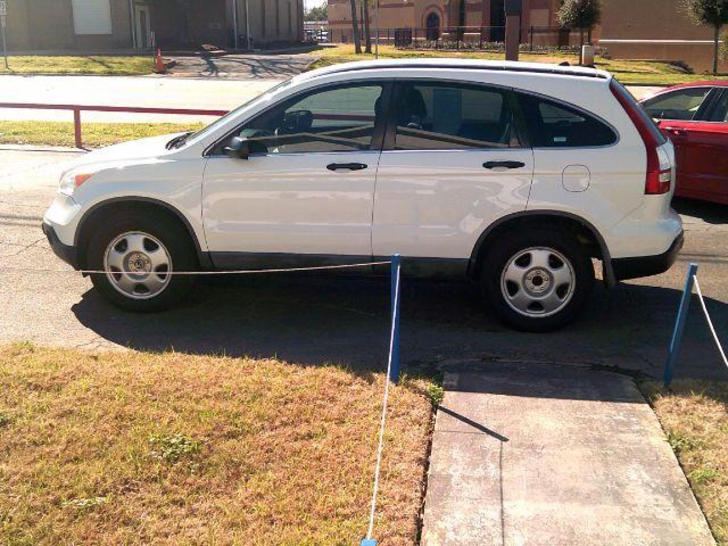 2008 Taffeta White /Black Cloth Interior Honda CR-V LX 2WD AT (3CZRE38368G) with an 2.4L L4 DOHC 16V engine, 5-Speed Automatic transmission, located at 116 N. Frazier Street, Conroe, TX, 77301, (936) 647-0690, 30.308662, -95.460480 - Photo#3