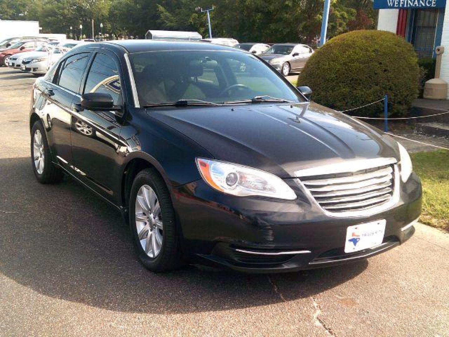 2011 Black Chrysler 200 Touring (1C3BC1FG4BN) with an 3.6L V6 DOHC 24V FFV engine, 6-Speed Automatic transmission, located at 116 N. Frazier Street, Conroe, TX, 77301, (936) 647-0690, 30.308662, -95.460480 - Photo#1