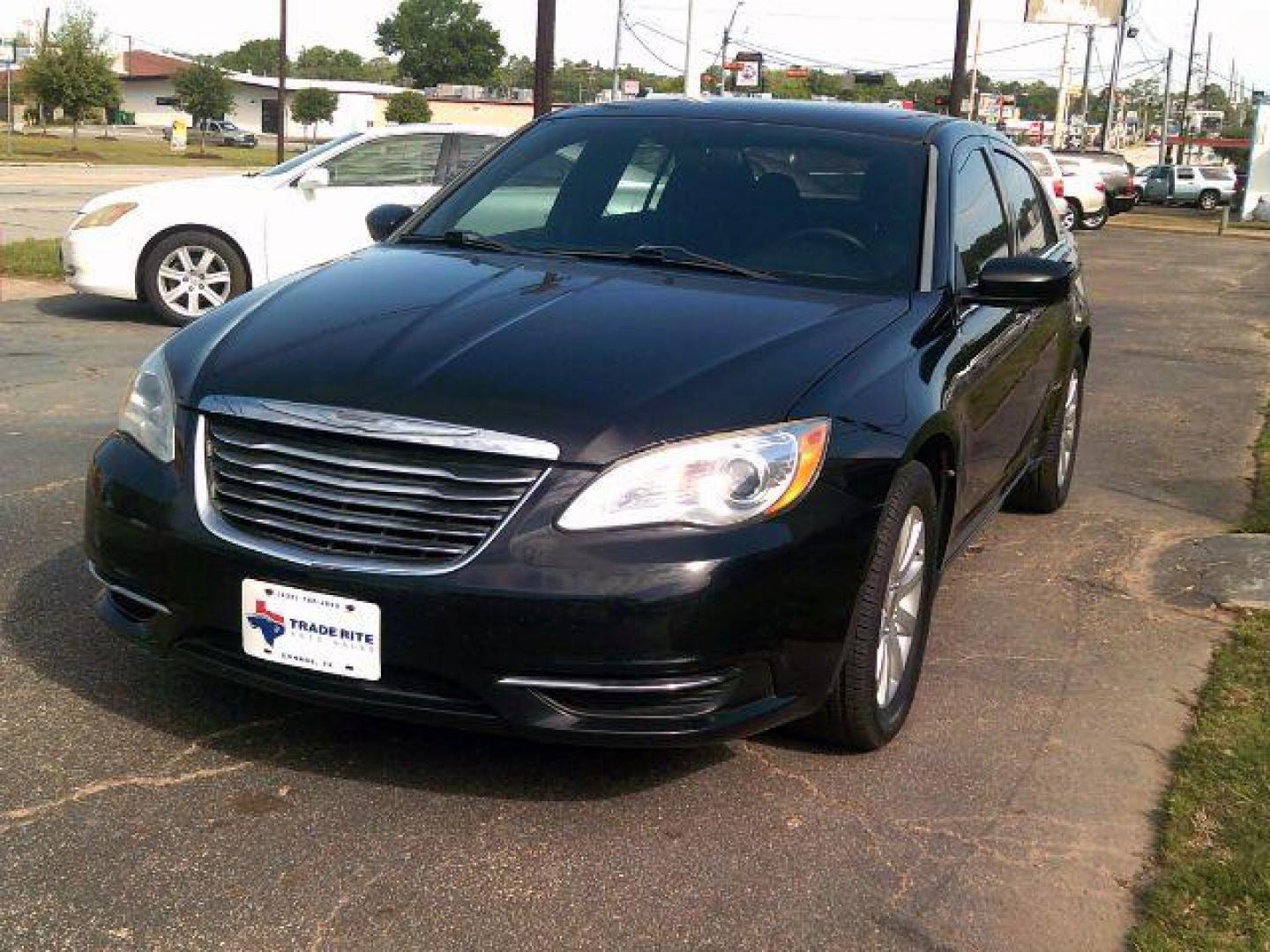 2011 Black Chrysler 200 Touring (1C3BC1FG4BN) with an 3.6L V6 DOHC 24V FFV engine, 6-Speed Automatic transmission, located at 116 N. Frazier Street, Conroe, TX, 77301, (936) 647-0690, 30.308662, -95.460480 - Photo#2