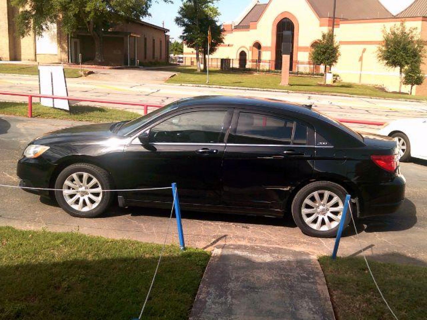 2011 Black Chrysler 200 Touring (1C3BC1FG4BN) with an 3.6L V6 DOHC 24V FFV engine, 6-Speed Automatic transmission, located at 116 N. Frazier Street, Conroe, TX, 77301, (936) 647-0690, 30.308662, -95.460480 - Photo#3