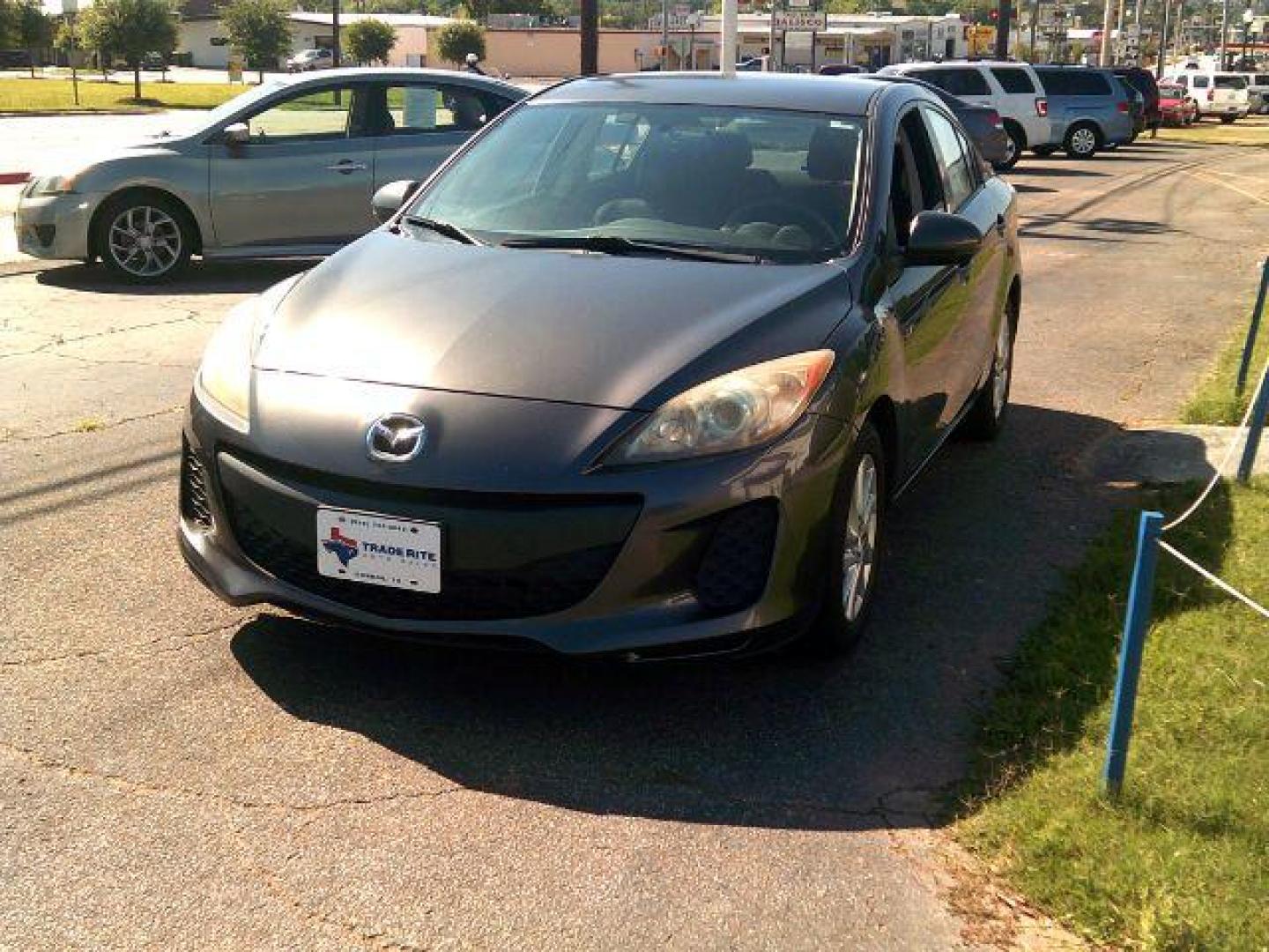 2013 Dolphin Gray Mica /Black Mazda MAZDA3 i Touring AT 4-Door (JM1BL1V7XD1) with an 2.0L L4 DOHC 16V engine, 5-Speed Automatic transmission, located at 116 N. Frazier Street, Conroe, TX, 77301, (936) 647-0690, 30.308662, -95.460480 - Photo#2