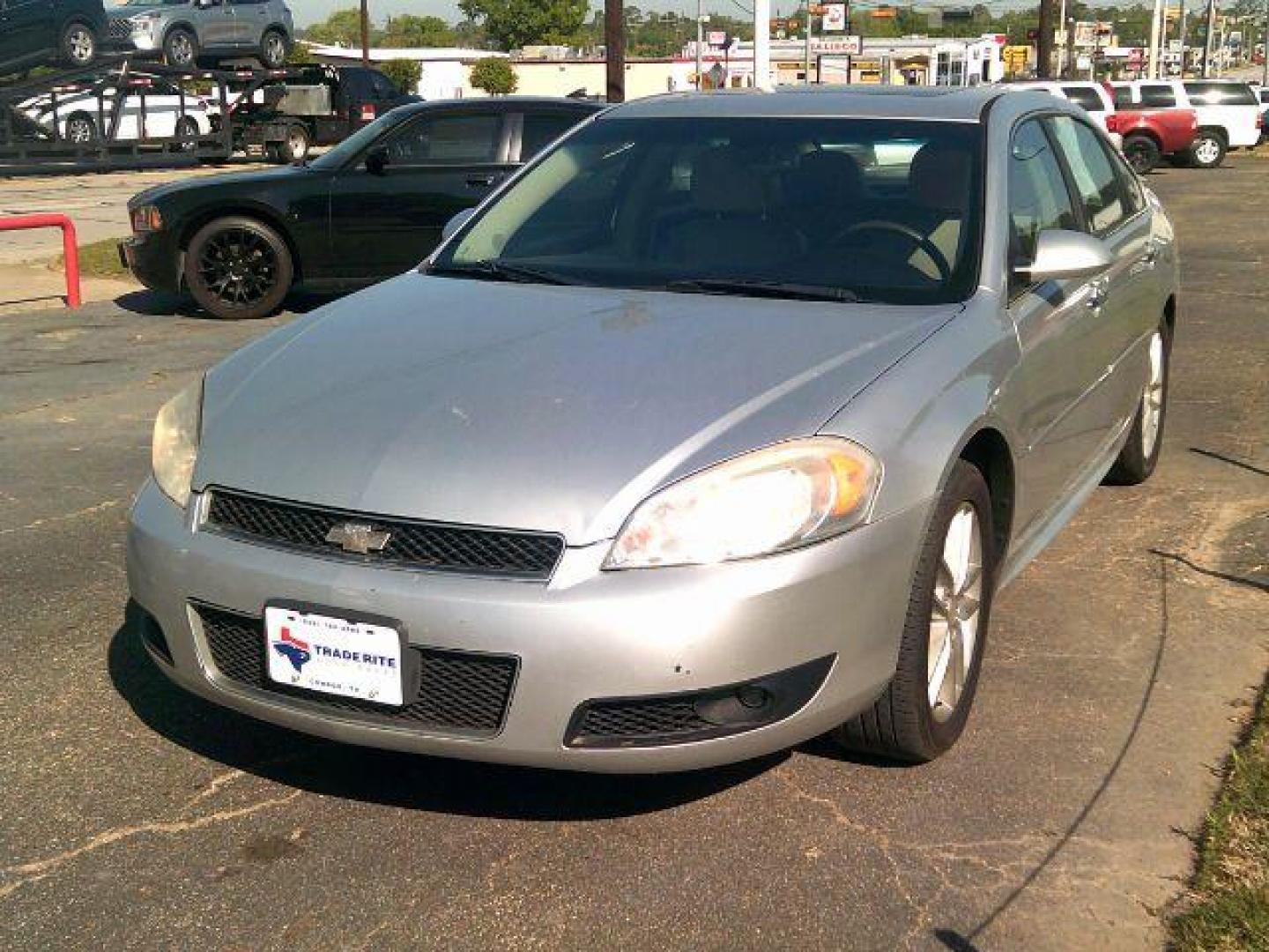 2012 Silver Ice Metallic /Gray Leather Interio Chevrolet Impala LTZ (2G1WC5E31C1) with an 3.6L V6 DOHC 16V FFV engine, 6-Speed Automatic transmission, located at 116 N. Frazier Street, Conroe, TX, 77301, (936) 647-0690, 30.308662, -95.460480 - Photo#2