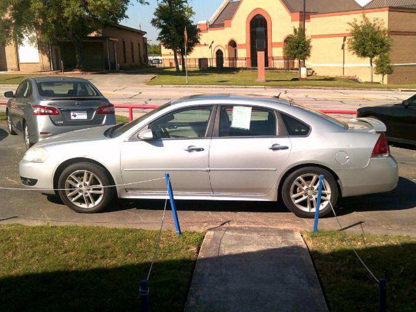 2012 Silver Ice Metallic /Gray Leather Interio Chevrolet Impala LTZ (2G1WC5E31C1) with an 3.6L V6 DOHC 16V FFV engine, 6-Speed Automatic transmission, located at 116 N. Frazier Street, Conroe, TX, 77301, (936) 647-0690, 30.308662, -95.460480 - Photo#3