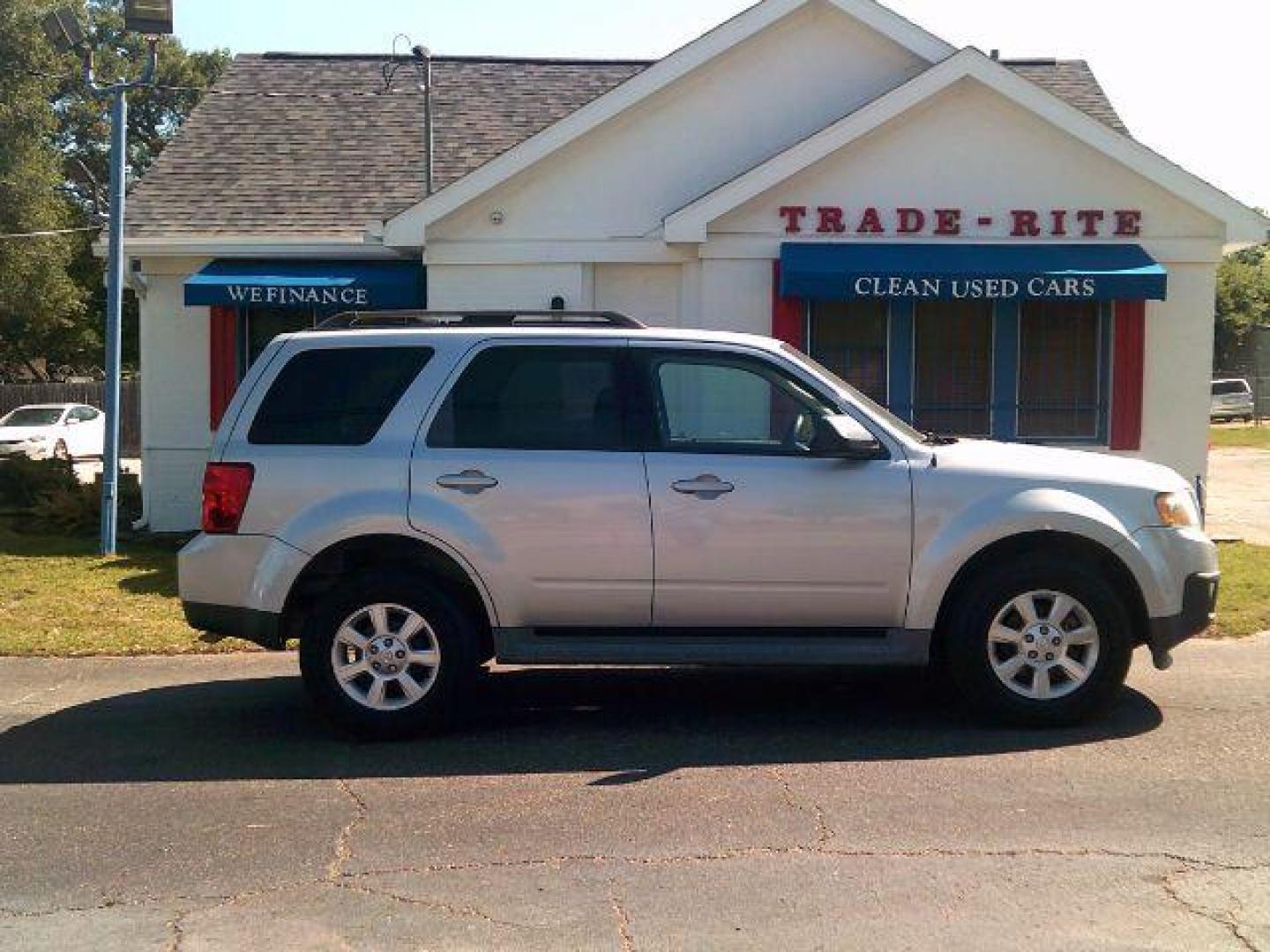 2009 Brilliant Silver Metallic /Gray Leather Interior Mazda Tribute s Grand Touring FWD (4F2CZ06G09K) with an 3.0L V6 DOHC 24V engine, 4-Speed Automatic transmission, located at 116 N. Frazier Street, Conroe, TX, 77301, (936) 647-0690, 30.308662, -95.460480 - Photo#0