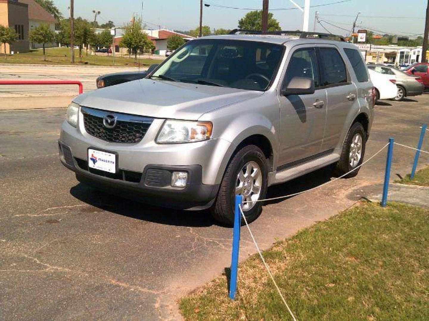 2009 Brilliant Silver Metallic /Gray Leather Interior Mazda Tribute s Grand Touring FWD (4F2CZ06G09K) with an 3.0L V6 DOHC 24V engine, 4-Speed Automatic transmission, located at 116 N. Frazier Street, Conroe, TX, 77301, (936) 647-0690, 30.308662, -95.460480 - Photo#2