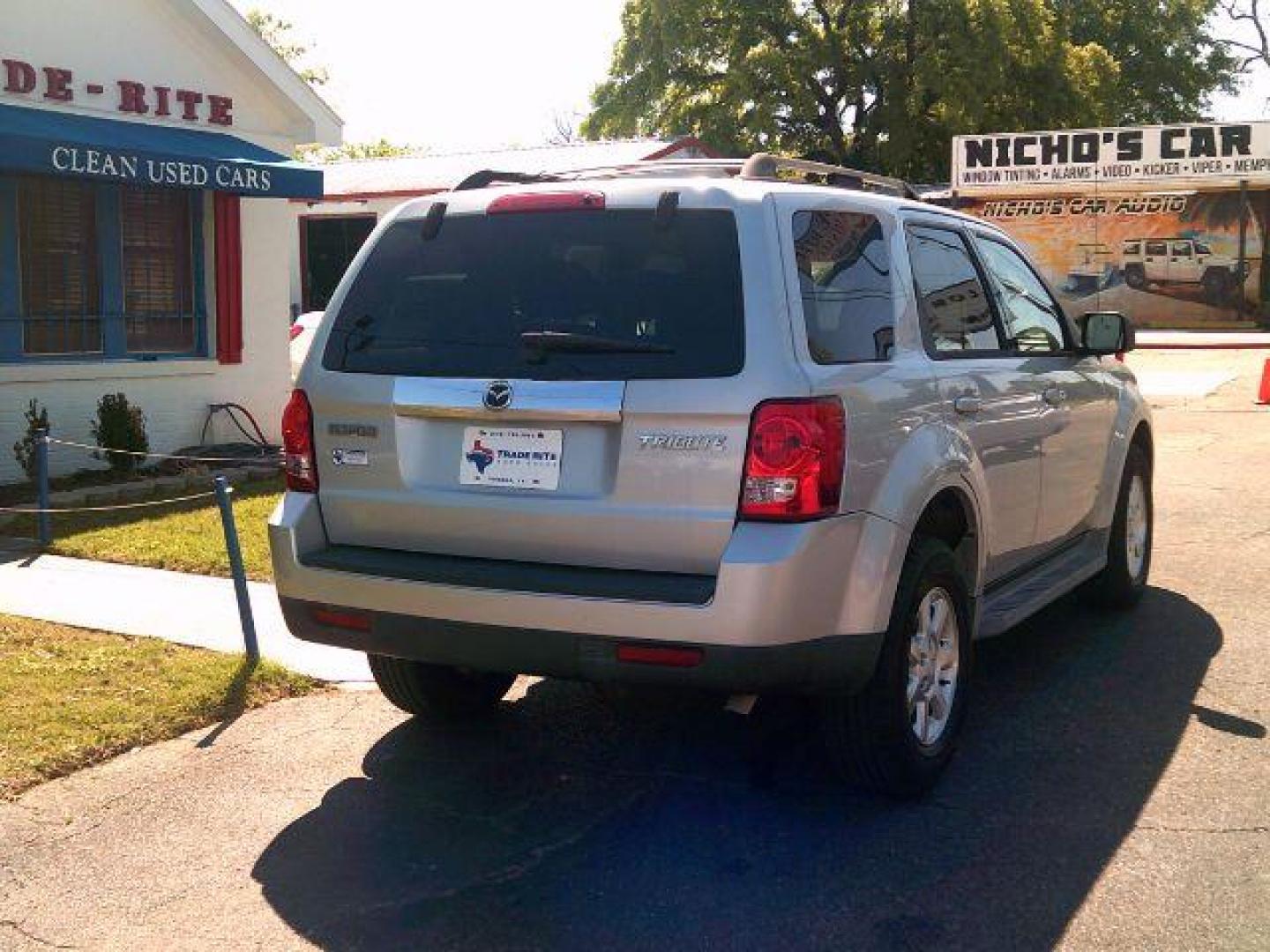 2009 Brilliant Silver Metallic /Gray Leather Interior Mazda Tribute s Grand Touring FWD (4F2CZ06G09K) with an 3.0L V6 DOHC 24V engine, 4-Speed Automatic transmission, located at 116 N. Frazier Street, Conroe, TX, 77301, (936) 647-0690, 30.308662, -95.460480 - Photo#5