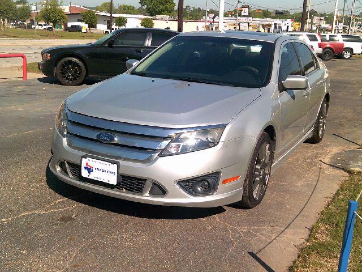 2010 Brilliant Silver Metallic /Charcoal Black Leather Interior Ford Fusion V6 Sport FWD (3FAHP0KC3AR) with an 3.5L V6 DOHC 24V engine, located at 116 N. Frazier Street, Conroe, TX, 77301, (936) 647-0690, 30.308662, -95.460480 - Photo#2