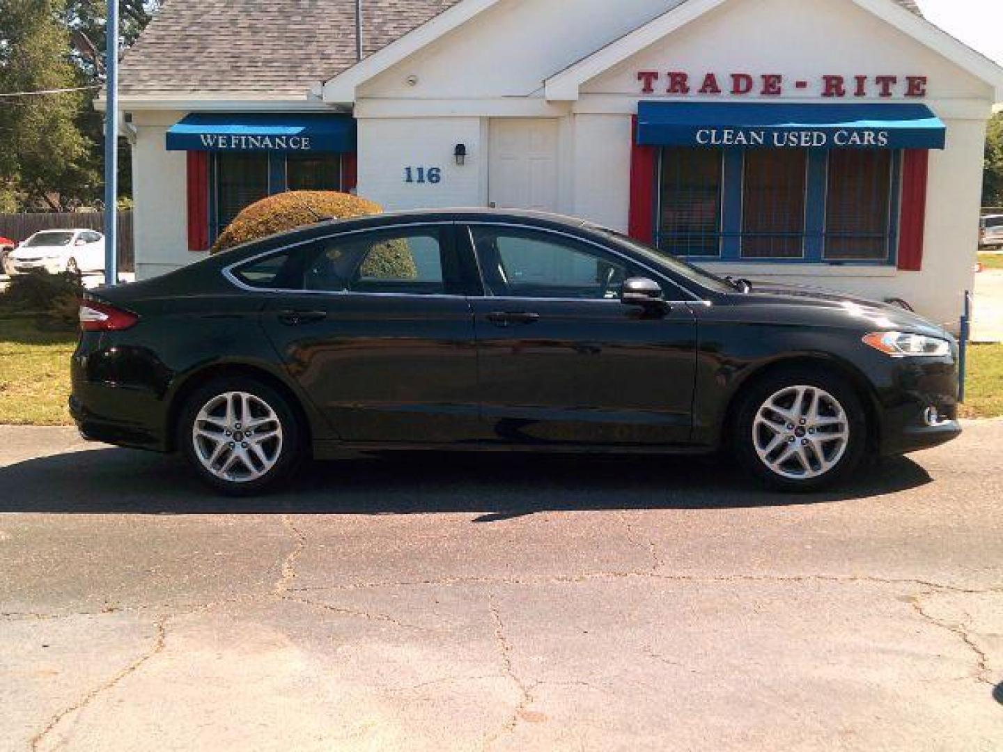 2014 Tuxedo Black Metallic /Ebony Ford Fusion SE (3FA6P0HD5ER) with an 1.5L L4 DOHC 16V engine, 5-Speed Automatic transmission, located at 116 N. Frazier Street, Conroe, TX, 77301, (936) 647-0690, 30.308662, -95.460480 - Photo#0