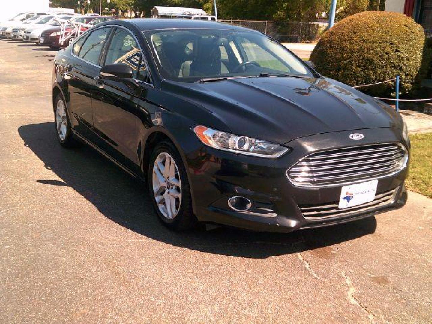 2014 Tuxedo Black Metallic /Ebony Ford Fusion SE (3FA6P0HD5ER) with an 1.5L L4 DOHC 16V engine, 5-Speed Automatic transmission, located at 116 N. Frazier Street, Conroe, TX, 77301, (936) 647-0690, 30.308662, -95.460480 - Photo#1