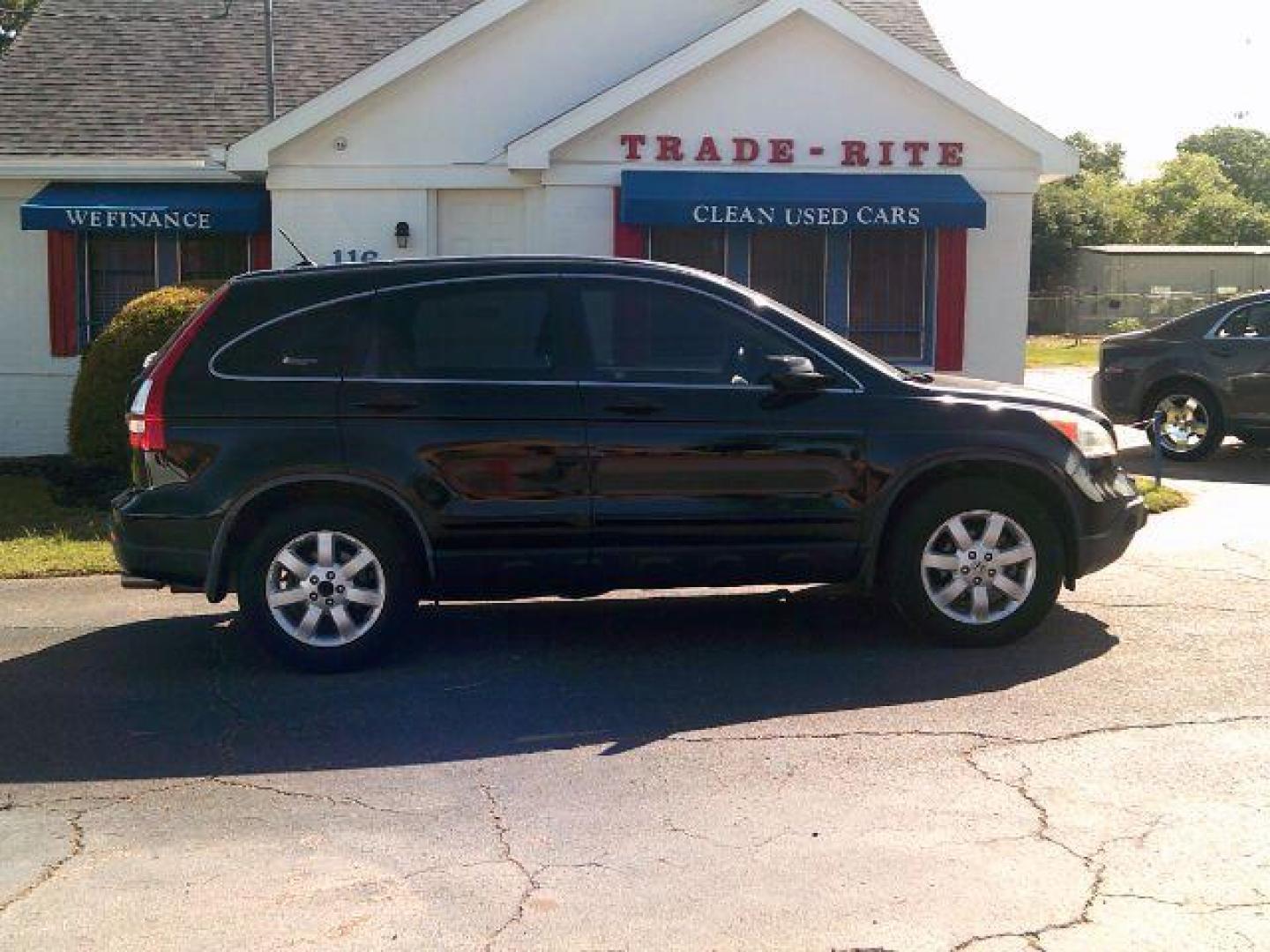 2009 Crystal Black Pearl /Gray Leather Interior Honda CR-V EX-L 2WD 5-Speed AT (JHLRE38799C) with an 2.4L L4 DOHC 16V engine, 5-Speed Automatic transmission, located at 116 N. Frazier Street, Conroe, TX, 77301, (936) 647-0690, 30.308662, -95.460480 - Photo#0