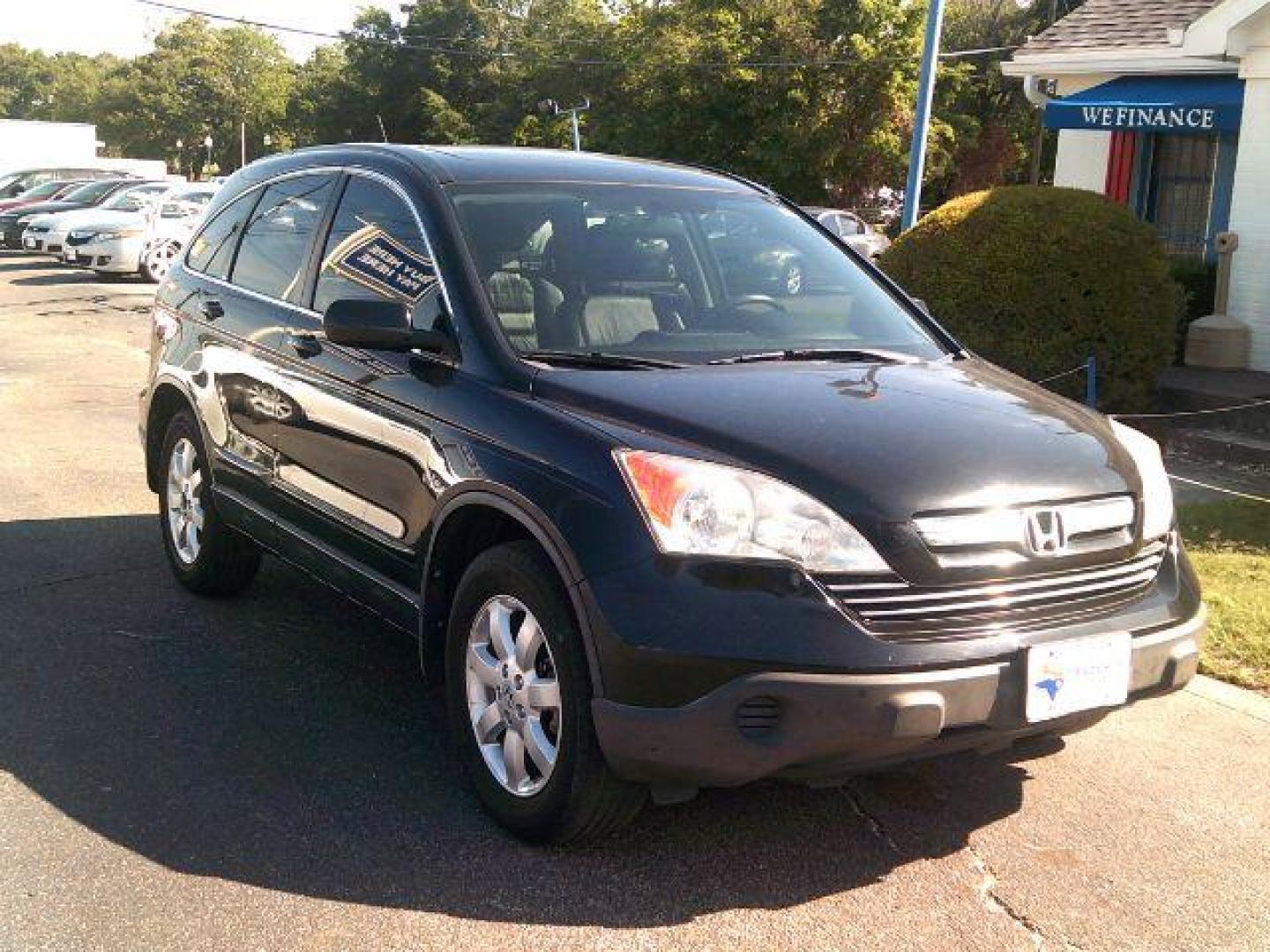 2009 Crystal Black Pearl /Gray Leather Interior Honda CR-V EX-L 2WD 5-Speed AT (JHLRE38799C) with an 2.4L L4 DOHC 16V engine, 5-Speed Automatic transmission, located at 116 N. Frazier Street, Conroe, TX, 77301, (936) 647-0690, 30.308662, -95.460480 - Photo#1