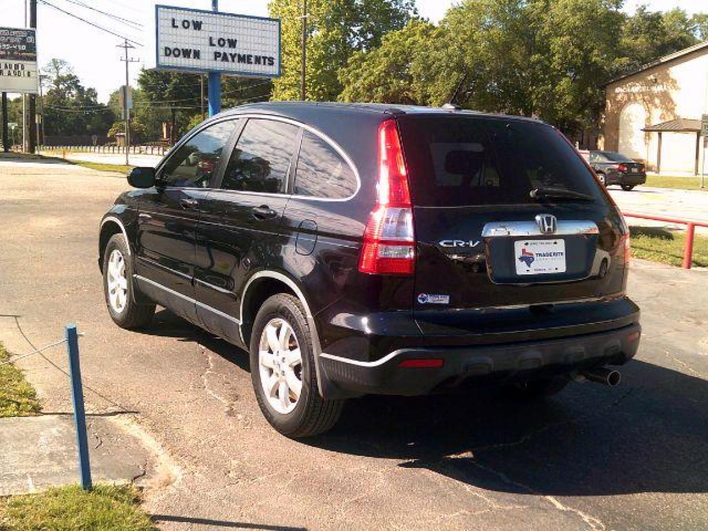 2009 Crystal Black Pearl /Gray Leather Interior Honda CR-V EX-L 2WD 5-Speed AT (JHLRE38799C) with an 2.4L L4 DOHC 16V engine, 5-Speed Automatic transmission, located at 116 N. Frazier Street, Conroe, TX, 77301, (936) 647-0690, 30.308662, -95.460480 - Photo#4