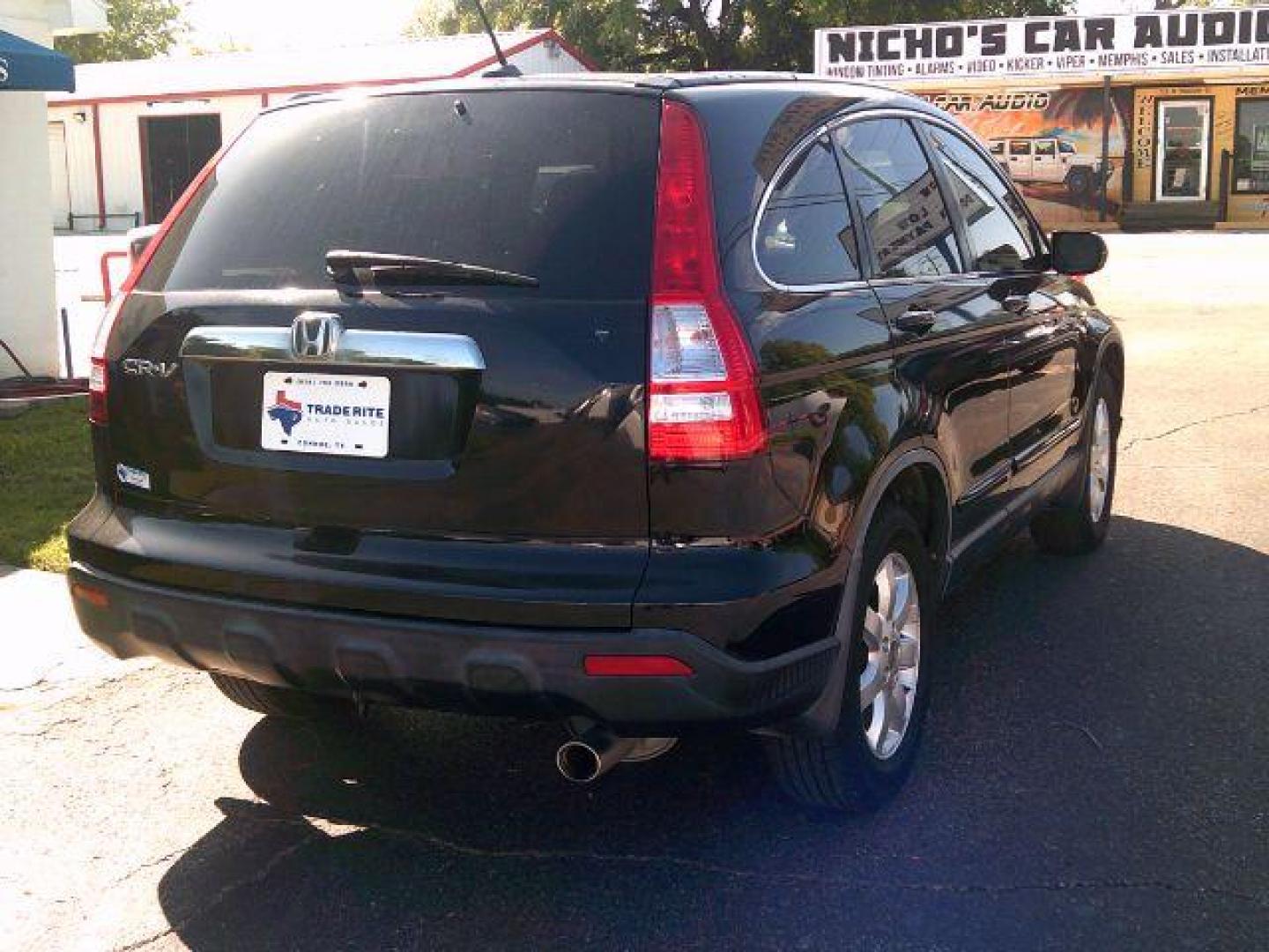 2009 Crystal Black Pearl /Gray Leather Interior Honda CR-V EX-L 2WD 5-Speed AT (JHLRE38799C) with an 2.4L L4 DOHC 16V engine, 5-Speed Automatic transmission, located at 116 N. Frazier Street, Conroe, TX, 77301, (936) 647-0690, 30.308662, -95.460480 - Photo#5