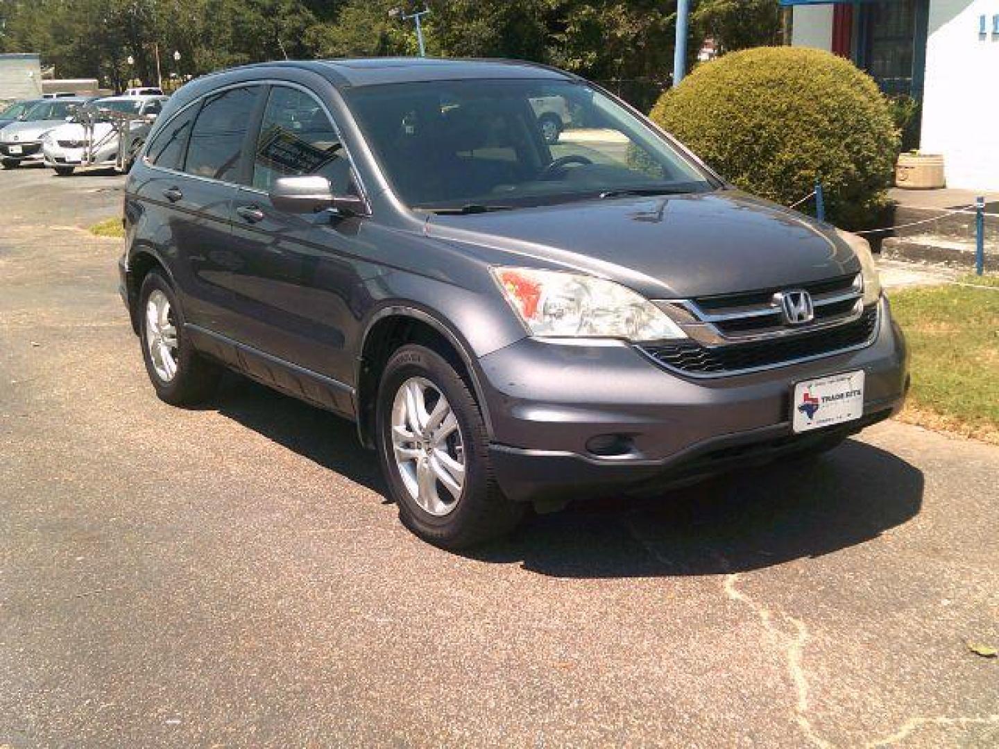 2010 Urban Titanium Metallic /Black Leather Interior Honda CR-V EX-L 4WD 5-Speed AT with Navigation (5J6RE4H7XAL) with an 2.4L L4 DOHC 16V engine, 5-Speed Automatic transmission, located at 116 N. Frazier Street, Conroe, TX, 77301, (936) 647-0690, 30.308662, -95.460480 - Photo#1