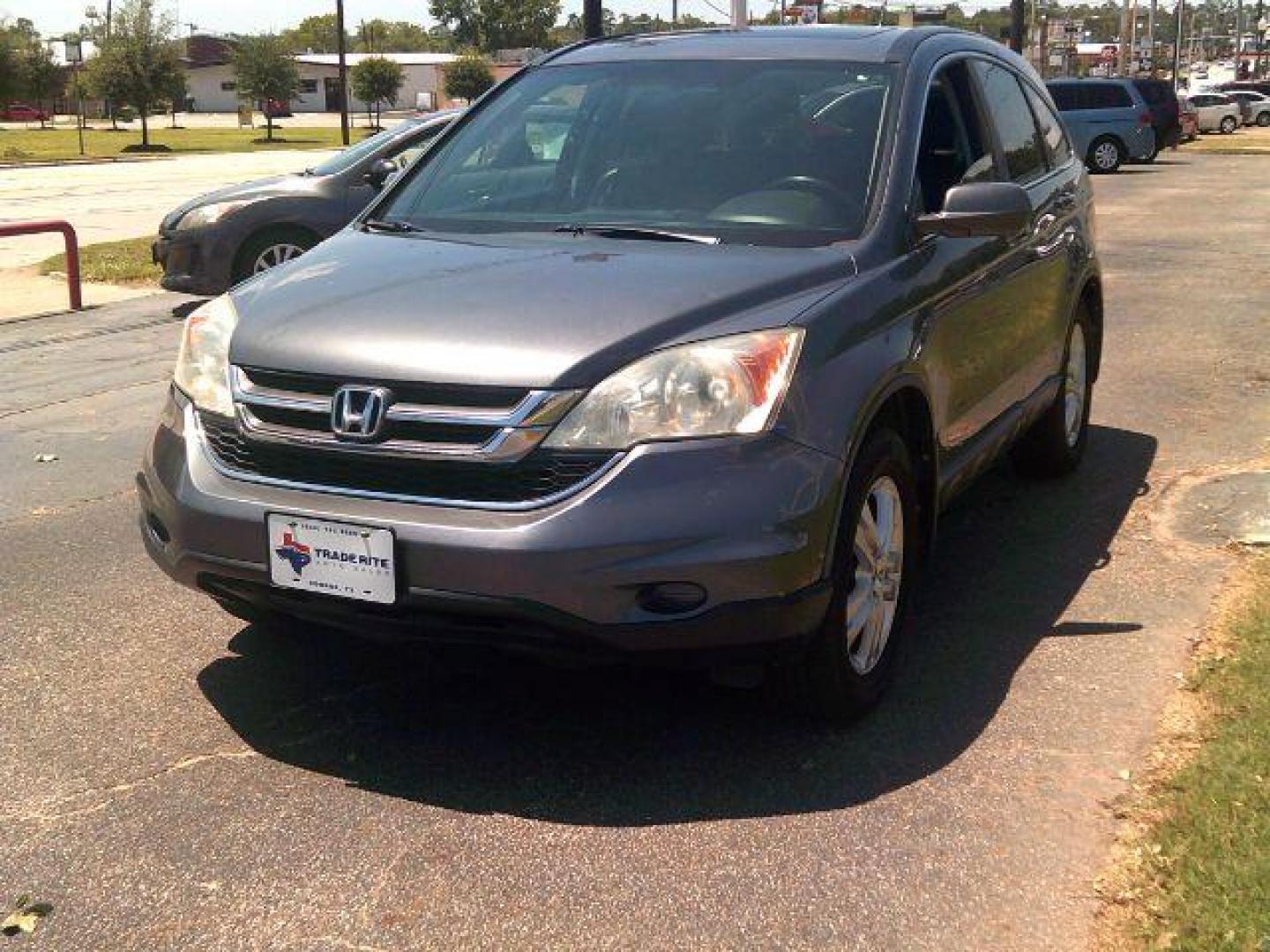 2010 Urban Titanium Metallic /Black Leather Interior Honda CR-V EX-L 4WD 5-Speed AT with Navigation (5J6RE4H7XAL) with an 2.4L L4 DOHC 16V engine, 5-Speed Automatic transmission, located at 116 N. Frazier Street, Conroe, TX, 77301, (936) 647-0690, 30.308662, -95.460480 - Photo#2