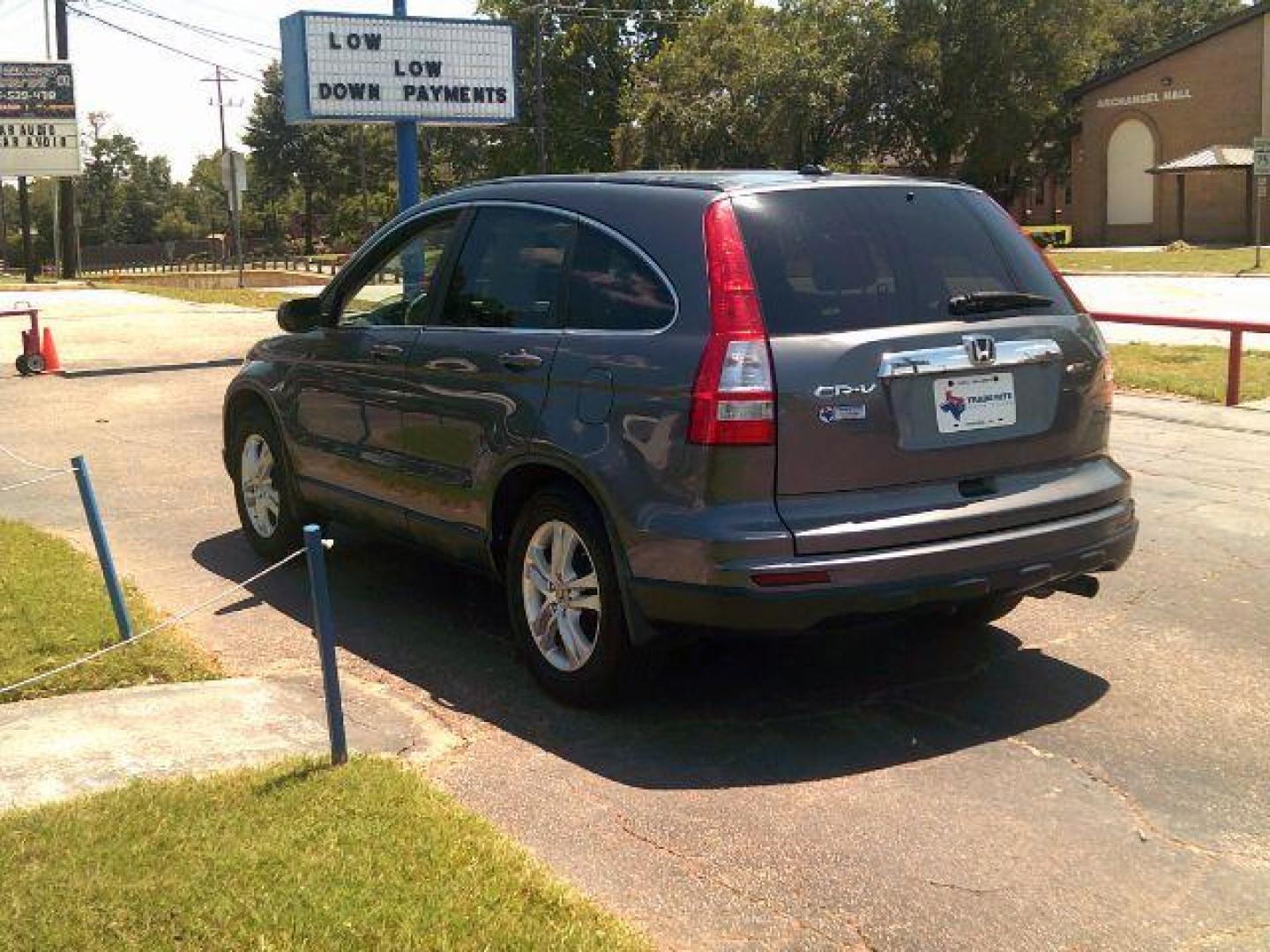 2010 Urban Titanium Metallic /Black Leather Interior Honda CR-V EX-L 4WD 5-Speed AT with Navigation (5J6RE4H7XAL) with an 2.4L L4 DOHC 16V engine, 5-Speed Automatic transmission, located at 116 N. Frazier Street, Conroe, TX, 77301, (936) 647-0690, 30.308662, -95.460480 - Photo#4