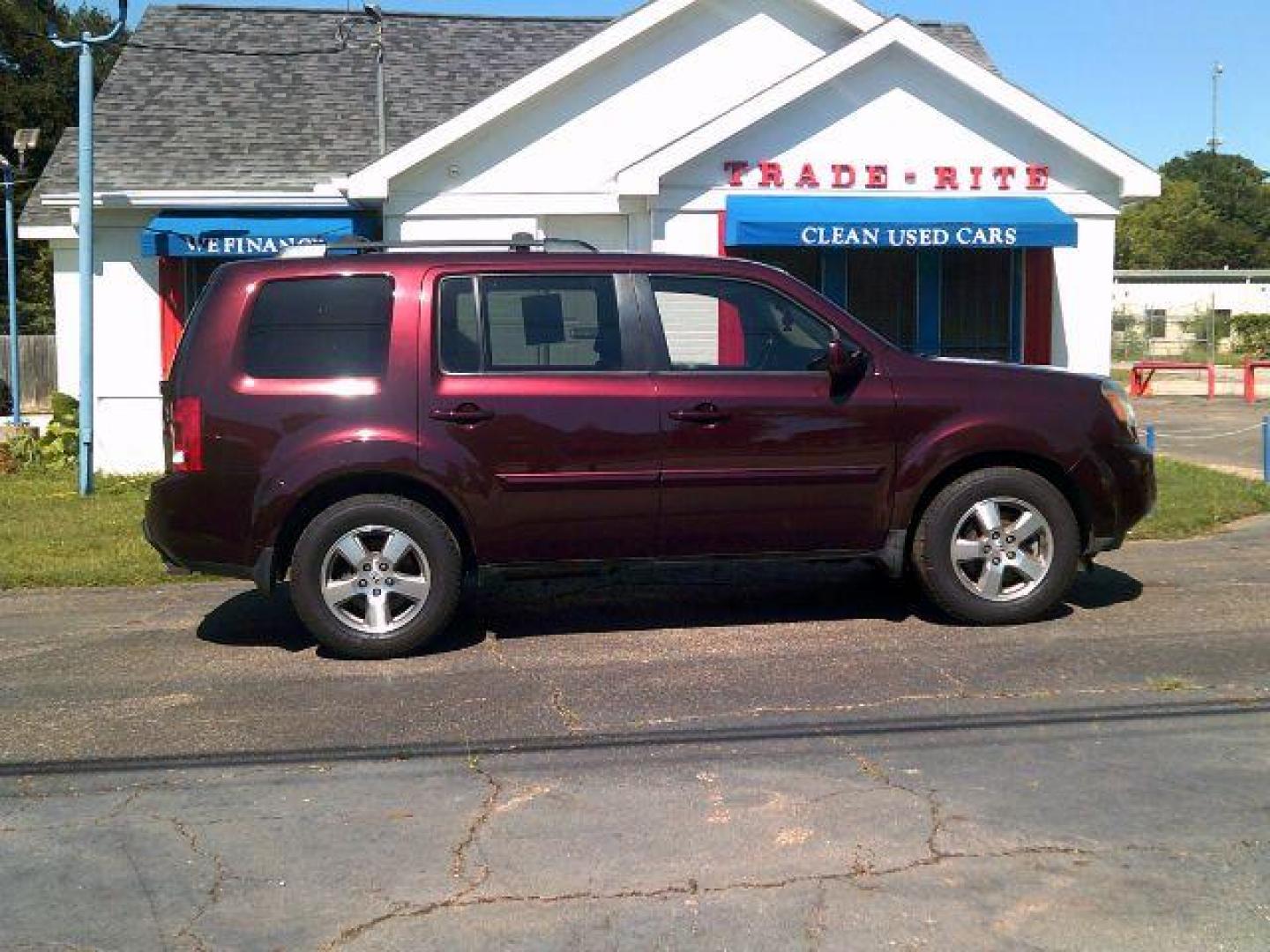 2010 Dark Cherry Pearl /Black Leather Interior Honda Pilot EX-L 2WD 5-Spd AT with DVD (5FNYF3H69AB) with an 3.5L V6 SOHC 24V engine, 5-Speed Automatic transmission, located at 116 N. Frazier Street, Conroe, TX, 77301, (936) 647-0690, 30.308662, -95.460480 - Photo#0