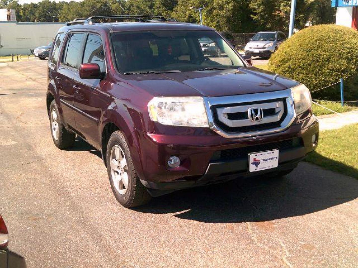 2010 Dark Cherry Pearl /Black Leather Interior Honda Pilot EX-L 2WD 5-Spd AT with DVD (5FNYF3H69AB) with an 3.5L V6 SOHC 24V engine, 5-Speed Automatic transmission, located at 116 N. Frazier Street, Conroe, TX, 77301, (936) 647-0690, 30.308662, -95.460480 - Photo#1