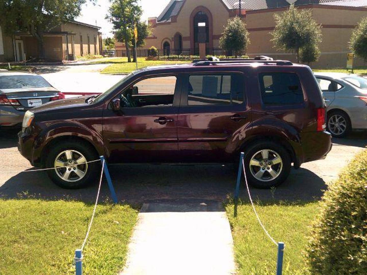 2010 Dark Cherry Pearl /Black Leather Interior Honda Pilot EX-L 2WD 5-Spd AT with DVD (5FNYF3H69AB) with an 3.5L V6 SOHC 24V engine, 5-Speed Automatic transmission, located at 116 N. Frazier Street, Conroe, TX, 77301, (936) 647-0690, 30.308662, -95.460480 - Photo#3