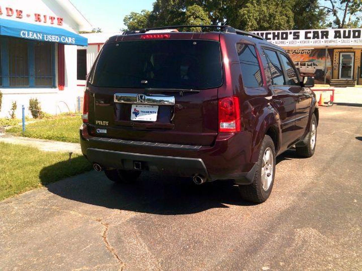 2010 Dark Cherry Pearl /Black Leather Interior Honda Pilot EX-L 2WD 5-Spd AT with DVD (5FNYF3H69AB) with an 3.5L V6 SOHC 24V engine, 5-Speed Automatic transmission, located at 116 N. Frazier Street, Conroe, TX, 77301, (936) 647-0690, 30.308662, -95.460480 - Photo#6