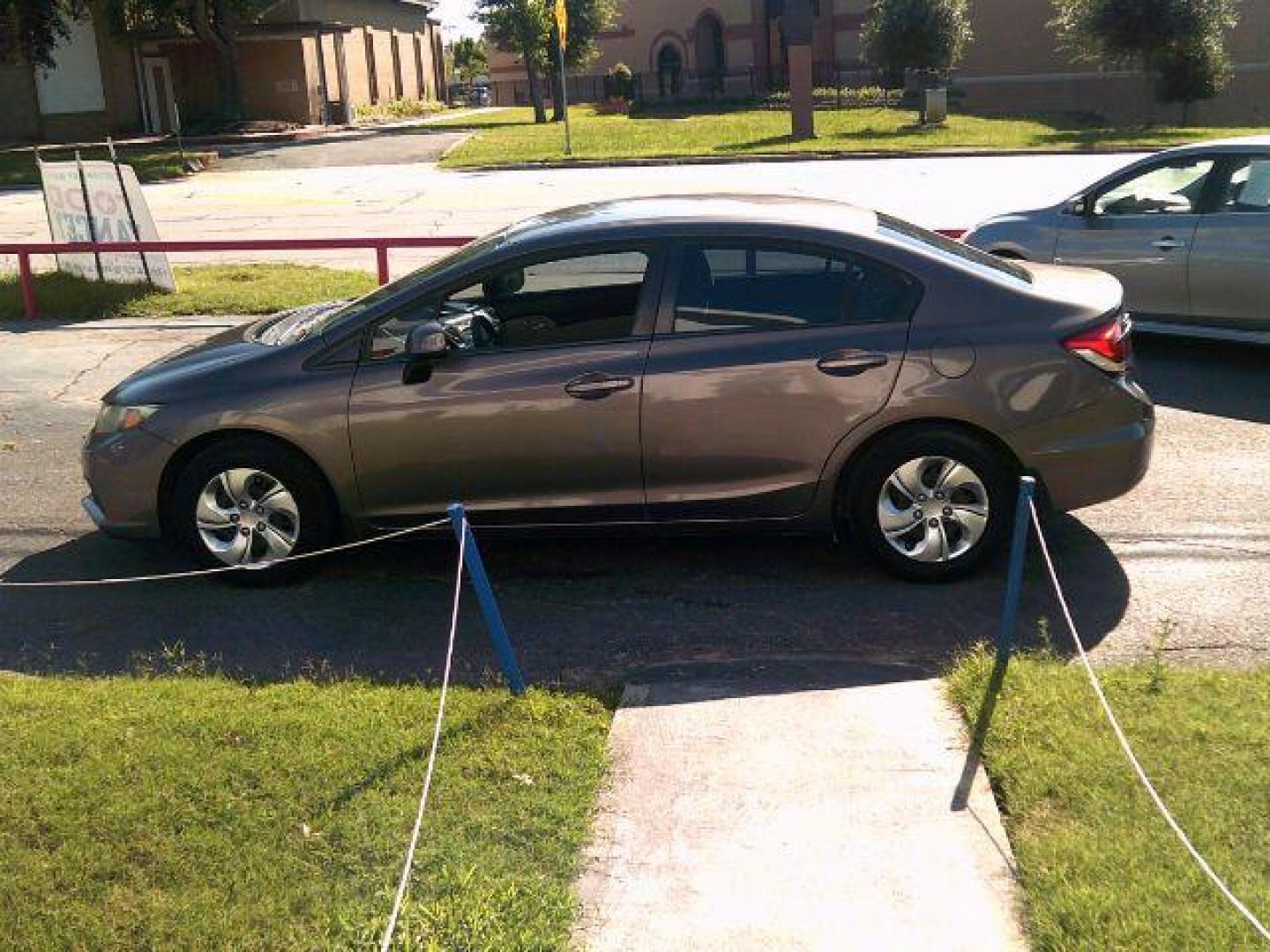 2013 Urban Titanium Metallic /Stone Cloth Interior Honda Civic LX Sedan 5-Speed AT (2HGFB2F57DH) with an 1.8L L4 SOHC 16V engine, 5-Speed Automatic transmission, located at 116 N. Frazier Street, Conroe, TX, 77301, (936) 647-0690, 30.308662, -95.460480 - Photo#3