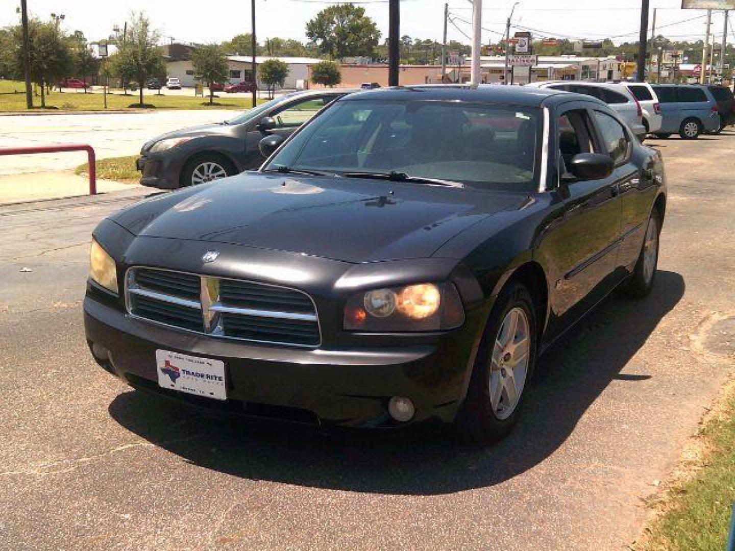 2006 Brilliant Black Crystal Pearl /Black Dodge Charger Base (2B3KA43G16H) with an 3.5L V6 SOHC 24V engine, 5-Speed Automatic transmission, located at 116 N. Frazier Street, Conroe, TX, 77301, (936) 647-0690, 30.308662, -95.460480 - Photo#2