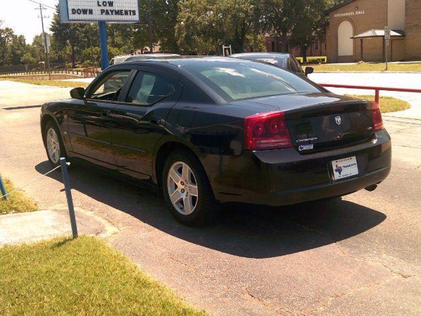 2006 Brilliant Black Crystal Pearl /Black Dodge Charger Base (2B3KA43G16H) with an 3.5L V6 SOHC 24V engine, 5-Speed Automatic transmission, located at 116 N. Frazier Street, Conroe, TX, 77301, (936) 647-0690, 30.308662, -95.460480 - Photo#4