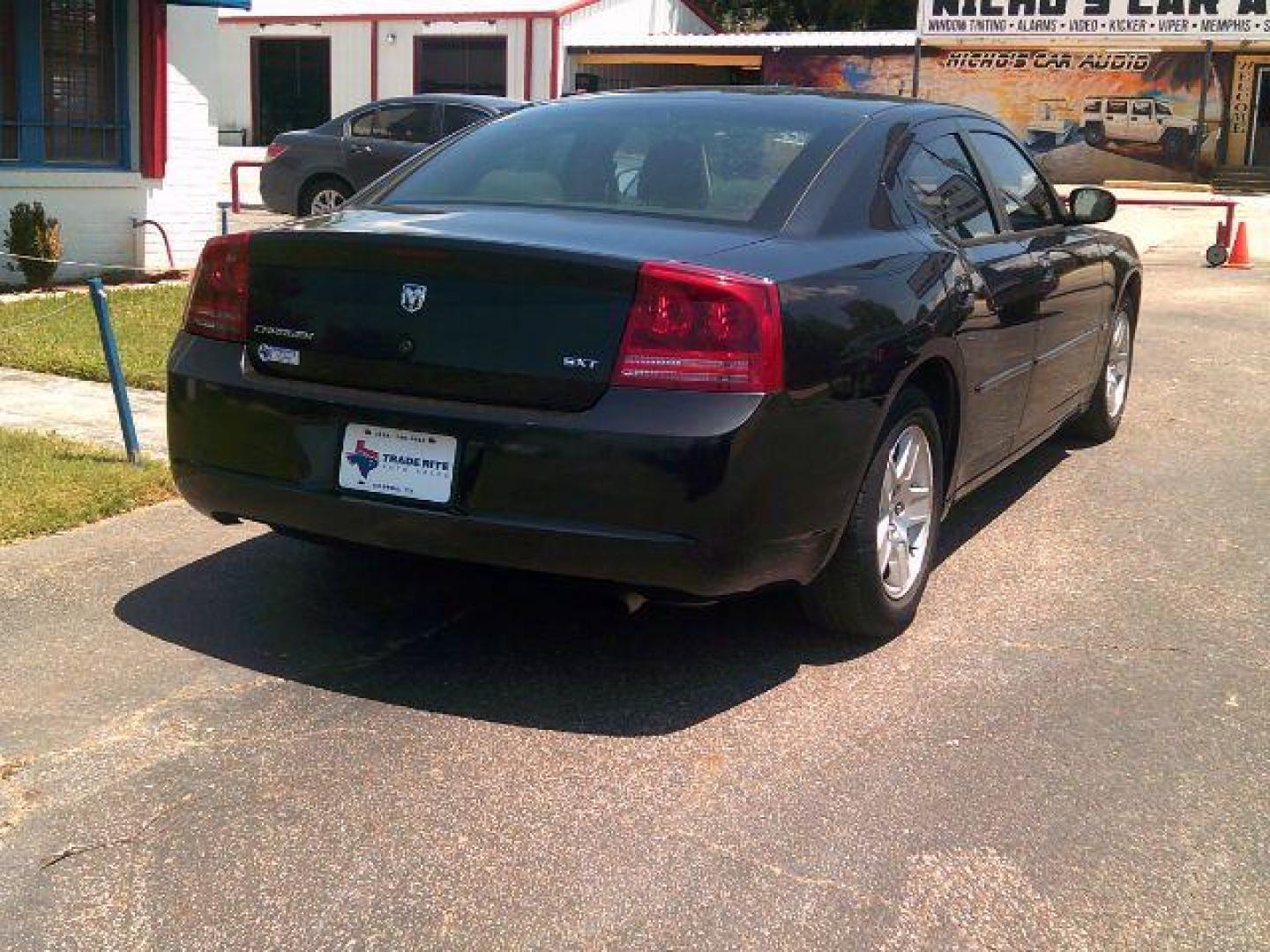 2006 Brilliant Black Crystal Pearl /Black Dodge Charger Base (2B3KA43G16H) with an 3.5L V6 SOHC 24V engine, 5-Speed Automatic transmission, located at 116 N. Frazier Street, Conroe, TX, 77301, (936) 647-0690, 30.308662, -95.460480 - Photo#5