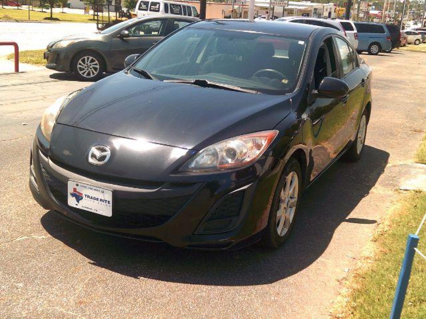 2010 Black Mica /Black Cloth Interior Mazda MAZDA3 i Sport 4-Door (JM1BL1SF5A1) with an 2.0L L4 DOHC 16V engine, located at 116 N. Frazier Street, Conroe, TX, 77301, (936) 647-0690, 30.308662, -95.460480 - Photo#2