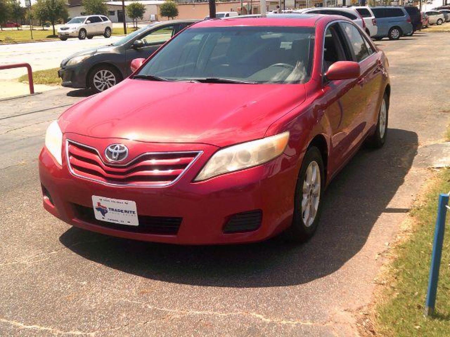 2011 Barcelona Red Metallic /Ash Cloth Interior Toyota Camry LE 6-Spd AT (4T4BF3EK5BR) with an 2.5L L4 DOHC 16V engine, 6-Speed Automatic transmission, located at 116 N. Frazier Street, Conroe, TX, 77301, (936) 647-0690, 30.308662, -95.460480 - Photo#2