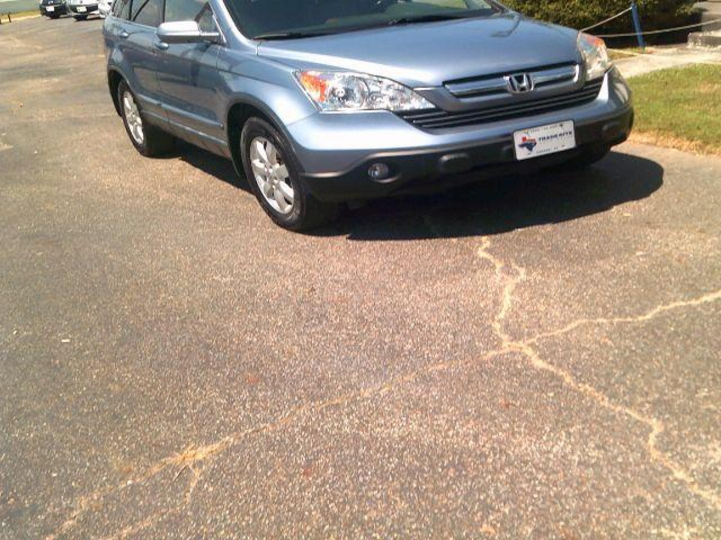 2008 Royal Blue Pearl Honda CR-V EX-L 4WD AT with Navigation (JHLRE48788C) with an 2.4L L4 DOHC 16V engine, 5-Speed Automatic transmission, located at 116 N. Frazier Street, Conroe, TX, 77301, (936) 647-0690, 30.308662, -95.460480 - Photo#1