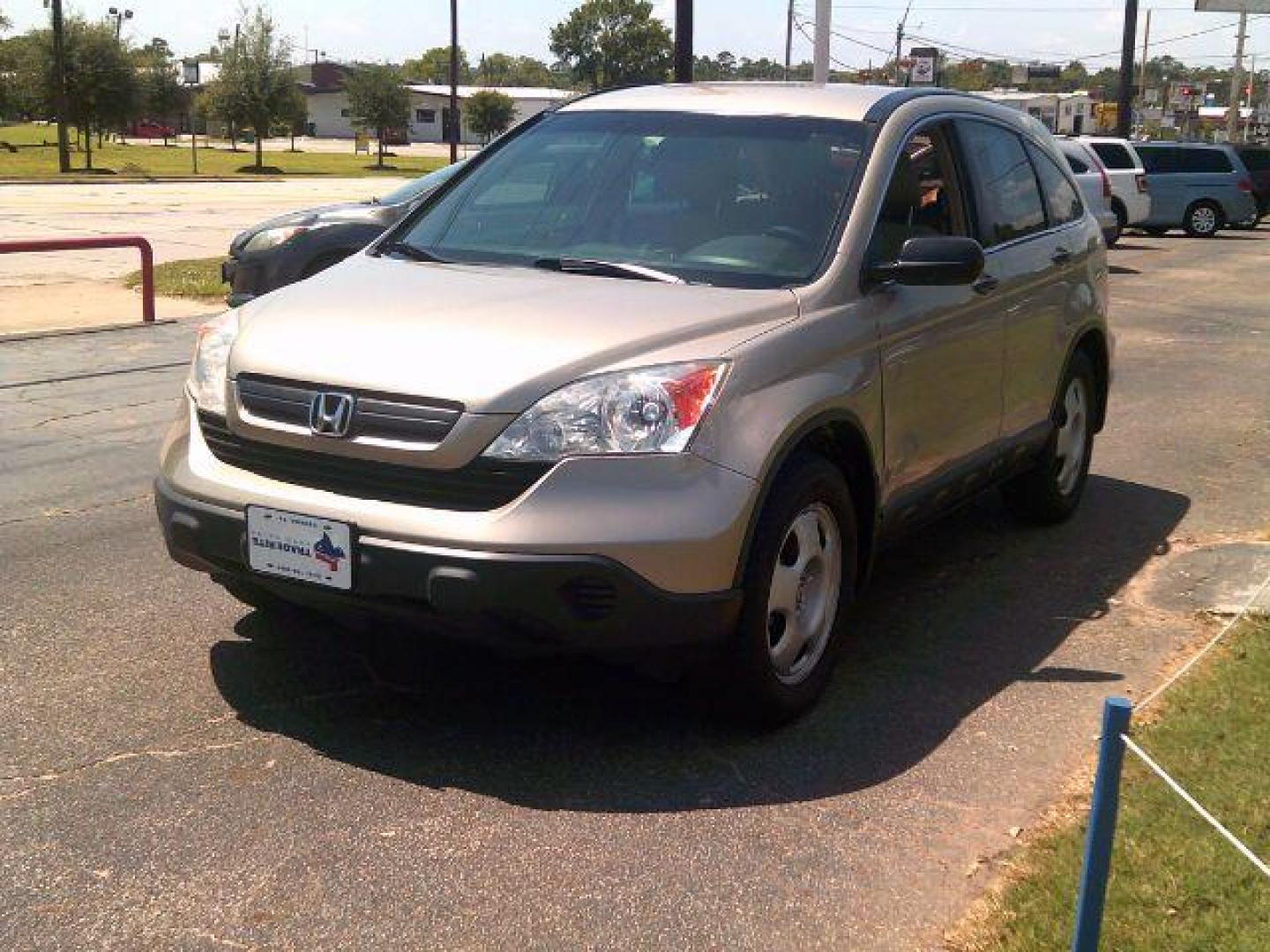 2009 Borrego Beige Metallic /Gray Cloth Interior Honda CR-V LX 2WD 5-Speed AT (3CZRE38379G) with an 2.4L L4 DOHC 16V engine, 5-Speed Automatic transmission, located at 116 N. Frazier Street, Conroe, TX, 77301, (936) 647-0690, 30.308662, -95.460480 - Photo#2