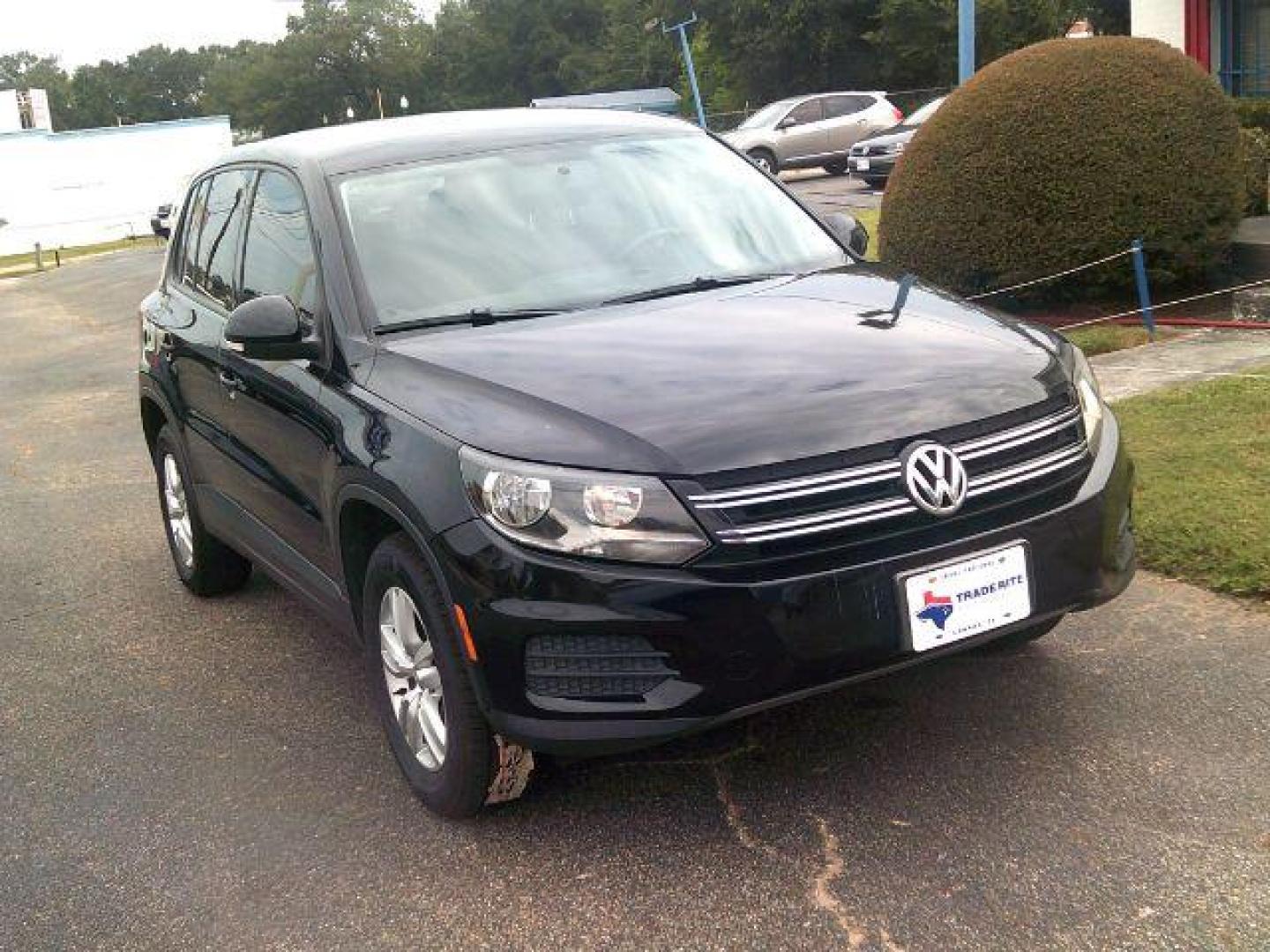 2013 Black /Black Volkswagen Tiguan SE (WVGAV7AX1DW) with an 2.0L L4 DOHC 16V TURBO engine, 6-Speed Automatic transmission, located at 116 N. Frazier Street, Conroe, TX, 77301, (936) 647-0690, 30.308662, -95.460480 - Photo#1