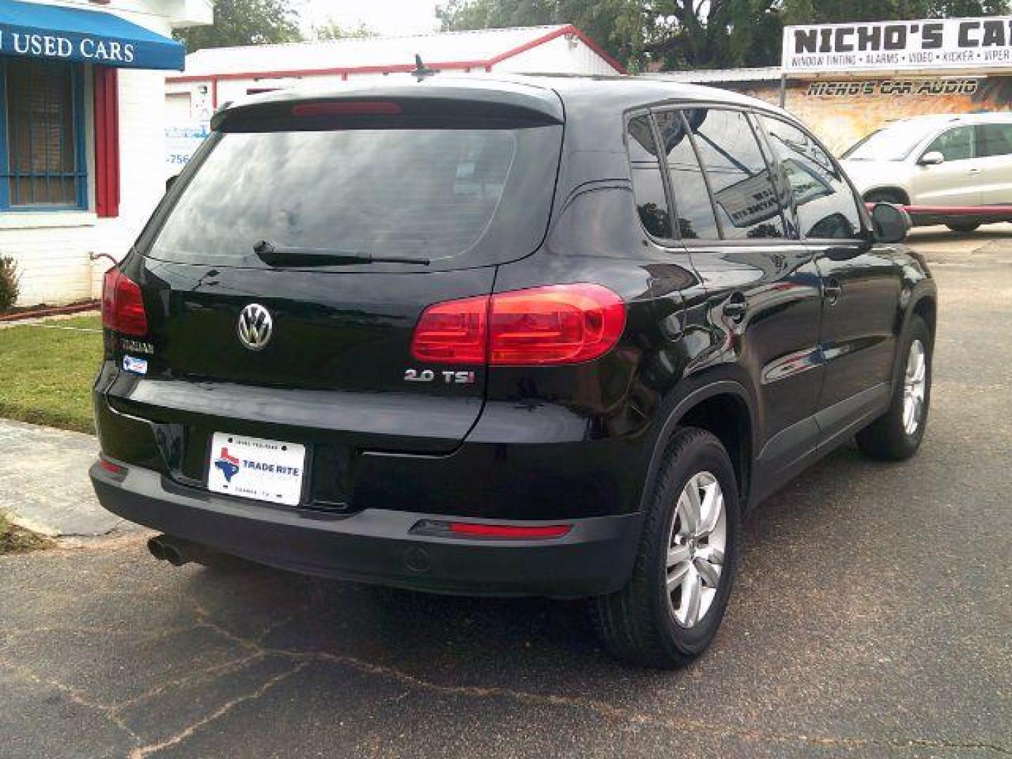 2013 Black /Black Volkswagen Tiguan SE (WVGAV7AX1DW) with an 2.0L L4 DOHC 16V TURBO engine, 6-Speed Automatic transmission, located at 116 N. Frazier Street, Conroe, TX, 77301, (936) 647-0690, 30.308662, -95.460480 - Photo#5