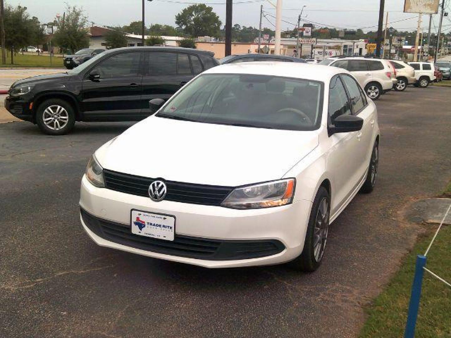 2013 Candy White /Titan Black Volkswagen Jetta S (3VW2K7AJ2DM) with an 2.0L L4 DOHC 16V engine, located at 116 N. Frazier Street, Conroe, TX, 77301, (936) 647-0690, 30.308662, -95.460480 - Photo#2