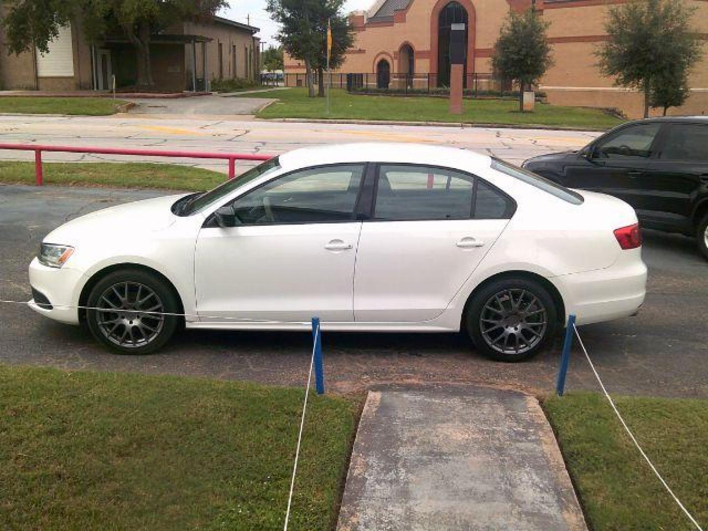 2013 Candy White /Titan Black Volkswagen Jetta S (3VW2K7AJ2DM) with an 2.0L L4 DOHC 16V engine, located at 116 N. Frazier Street, Conroe, TX, 77301, (936) 647-0690, 30.308662, -95.460480 - Photo#3